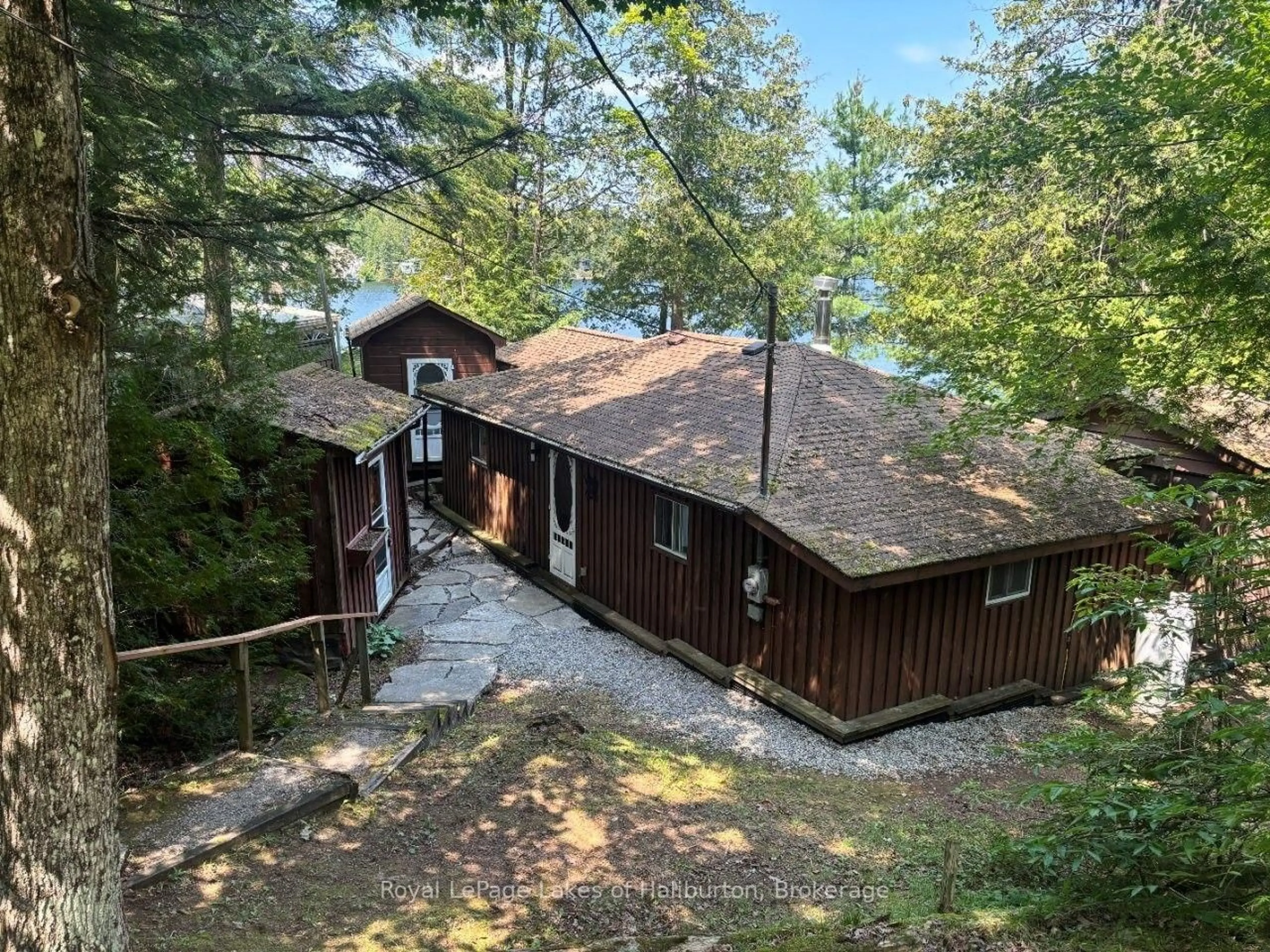 A pic from outside/outdoor area/front of a property/back of a property/a pic from drone, water/lake/river/ocean view for 1601 Crystal Lake Rd, Trent Lakes Ontario K0M 2A0