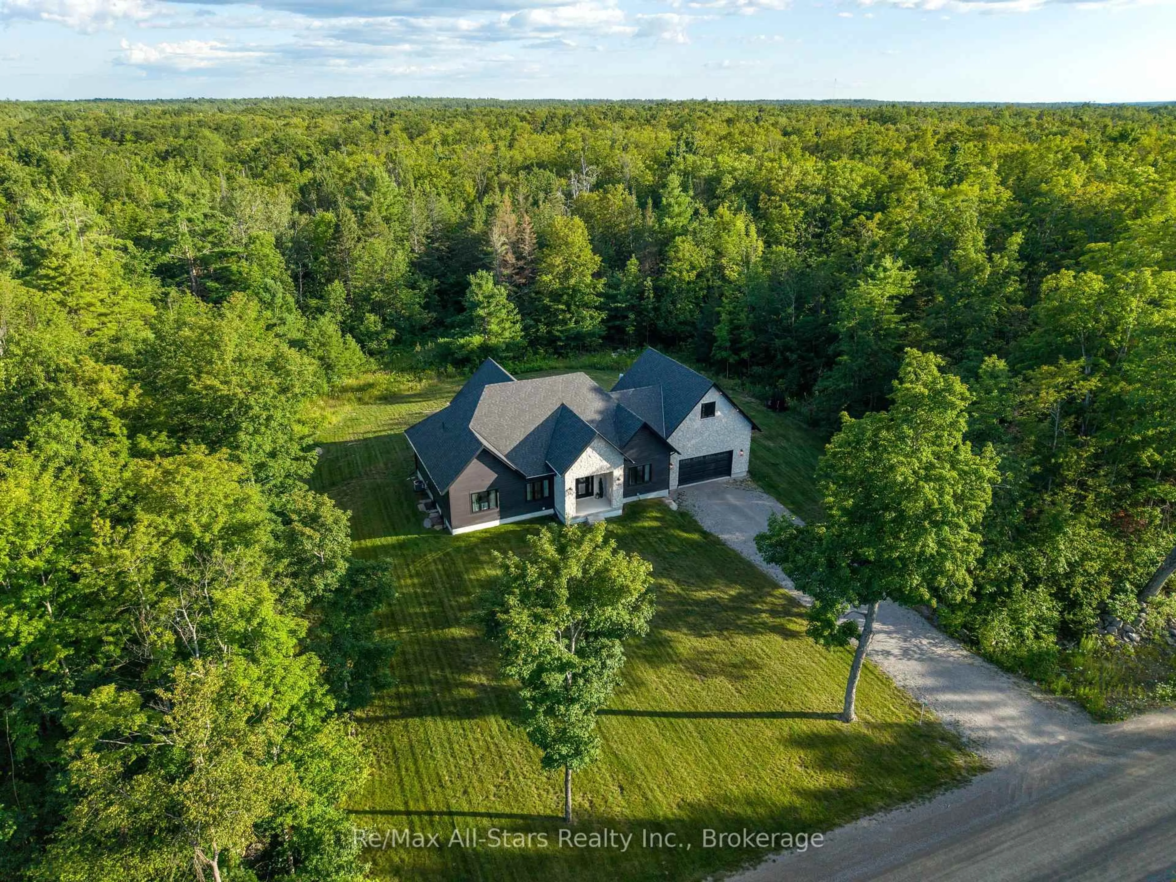 A pic from outside/outdoor area/front of a property/back of a property/a pic from drone, unknown for 210 White Valley Rd, Trent Lakes Ontario K0M 1A0