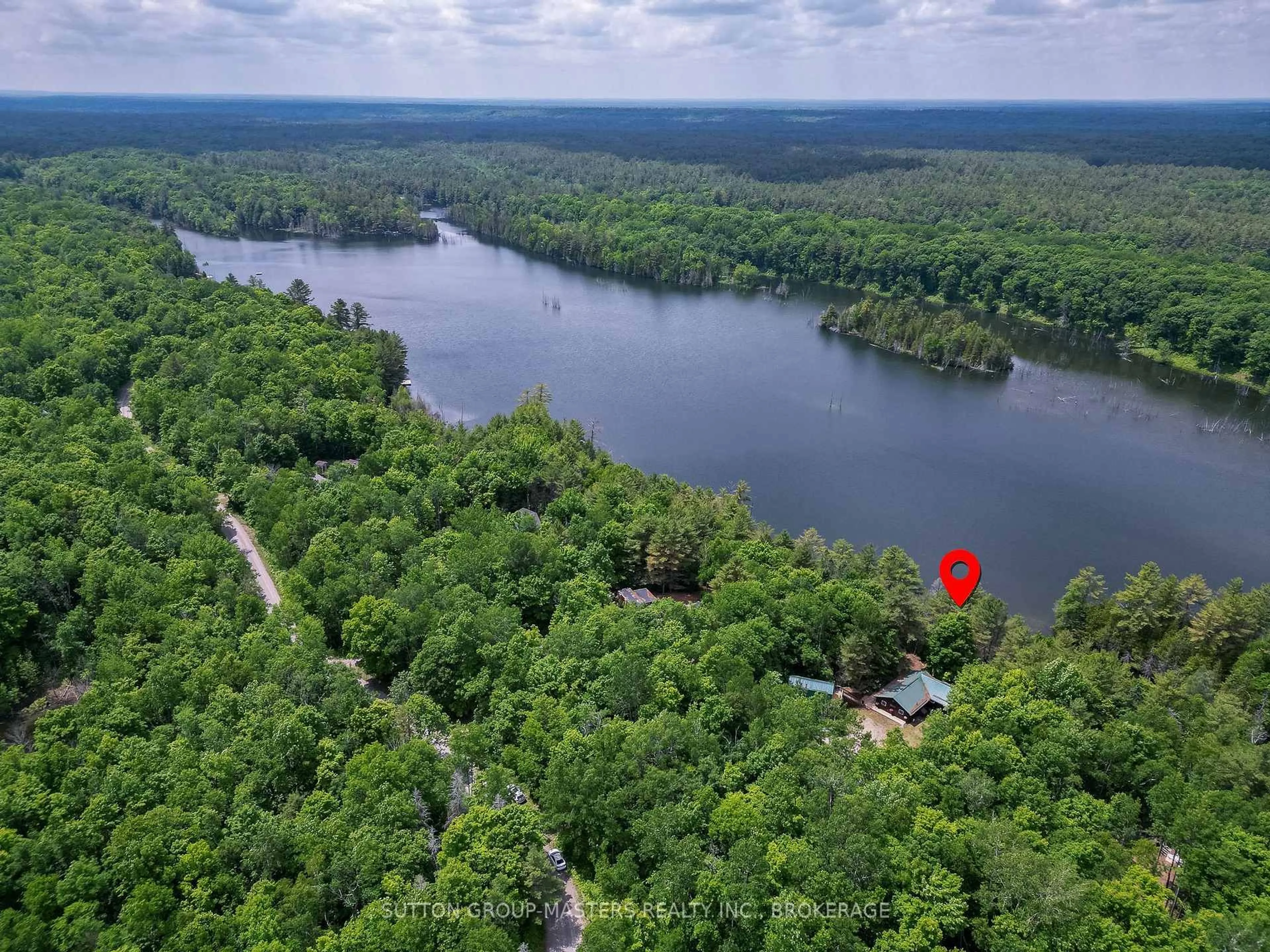 A pic from outside/outdoor area/front of a property/back of a property/a pic from drone, water/lake/river/ocean view for 313 Raccoon Lake Trail Rd, Kaladar Ontario K0H 1Z0