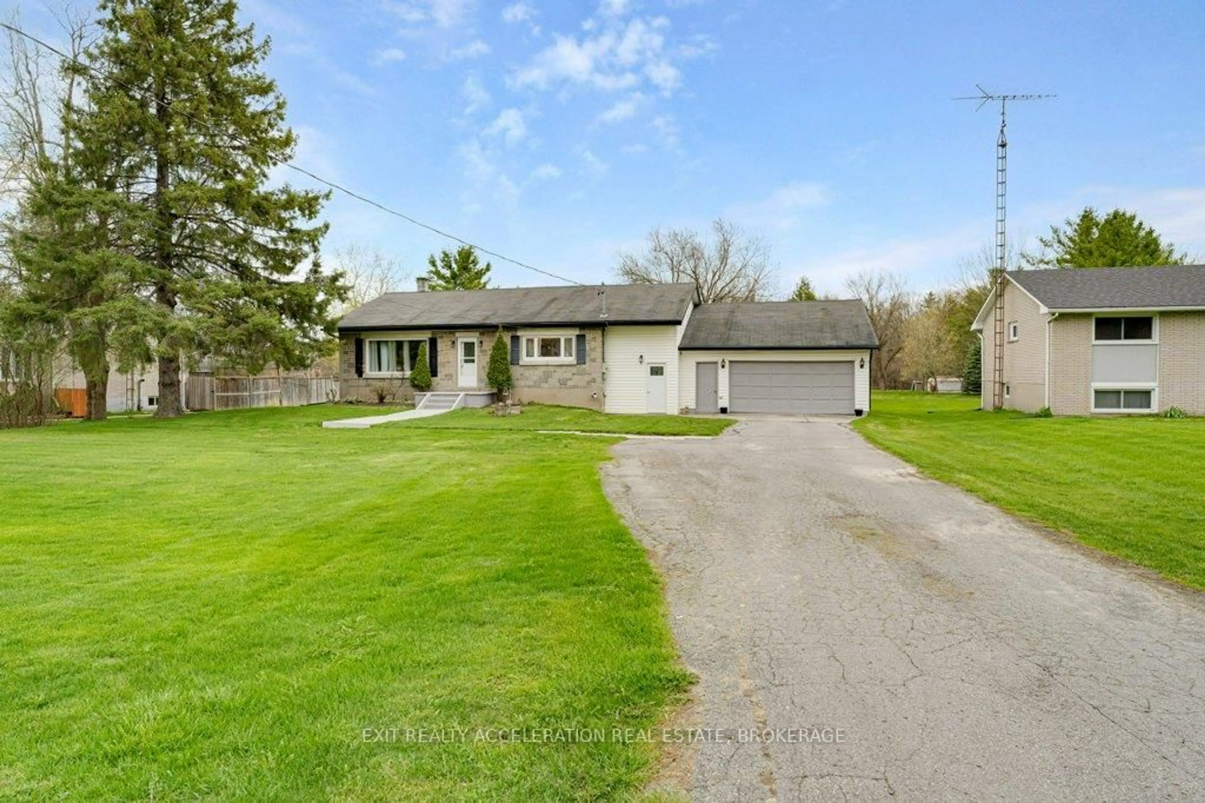 A pic from outside/outdoor area/front of a property/back of a property/a pic from drone, street for 7520 County Road 2, Napanee Ontario K7R 3K6