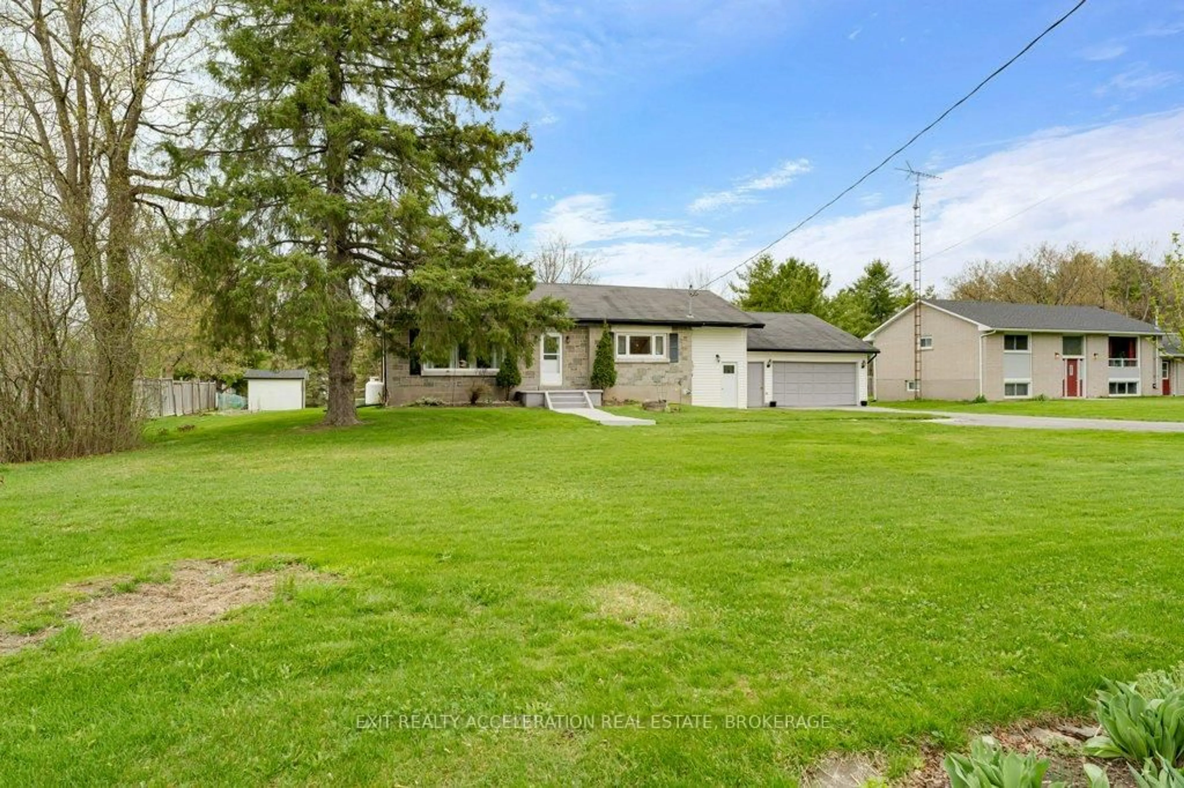 A pic from outside/outdoor area/front of a property/back of a property/a pic from drone, street for 7520 County Road 2, Napanee Ontario K7R 3K6