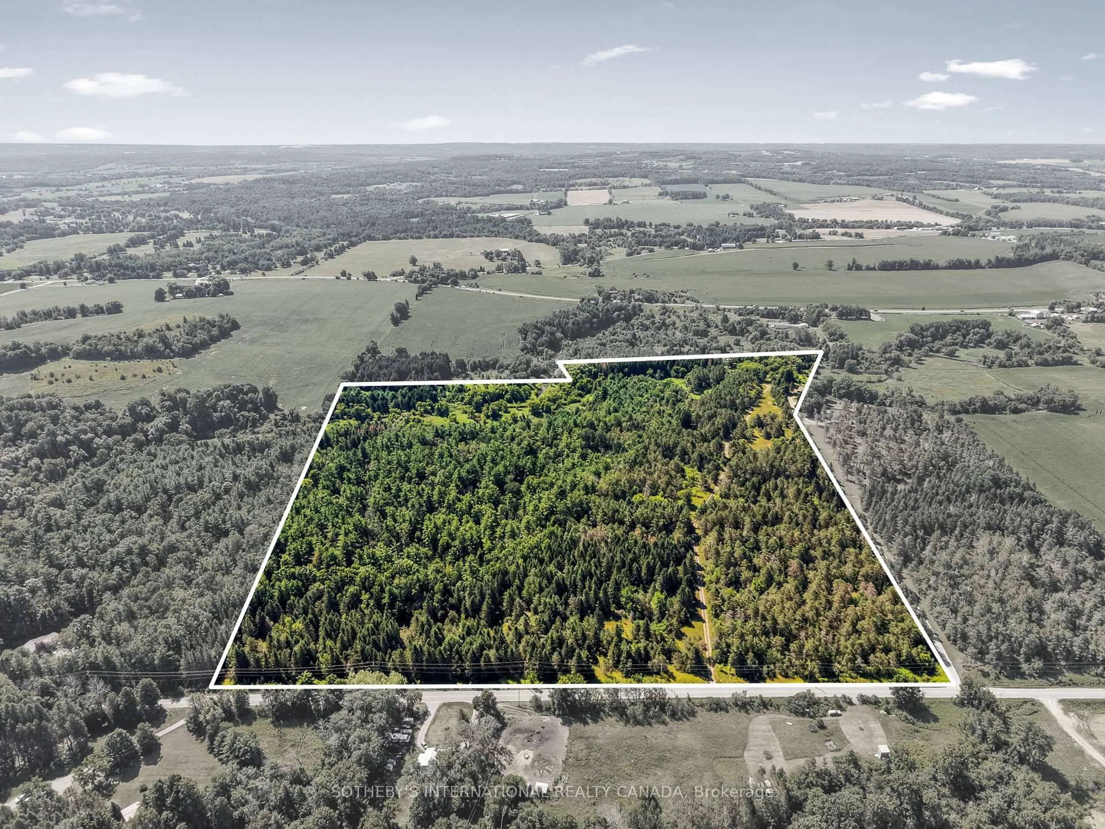 A pic from outside/outdoor area/front of a property/back of a property/a pic from drone, forest/trees view for 499 Concession Rd 4 East Rd, Trent Hills Ontario K0K 3K0