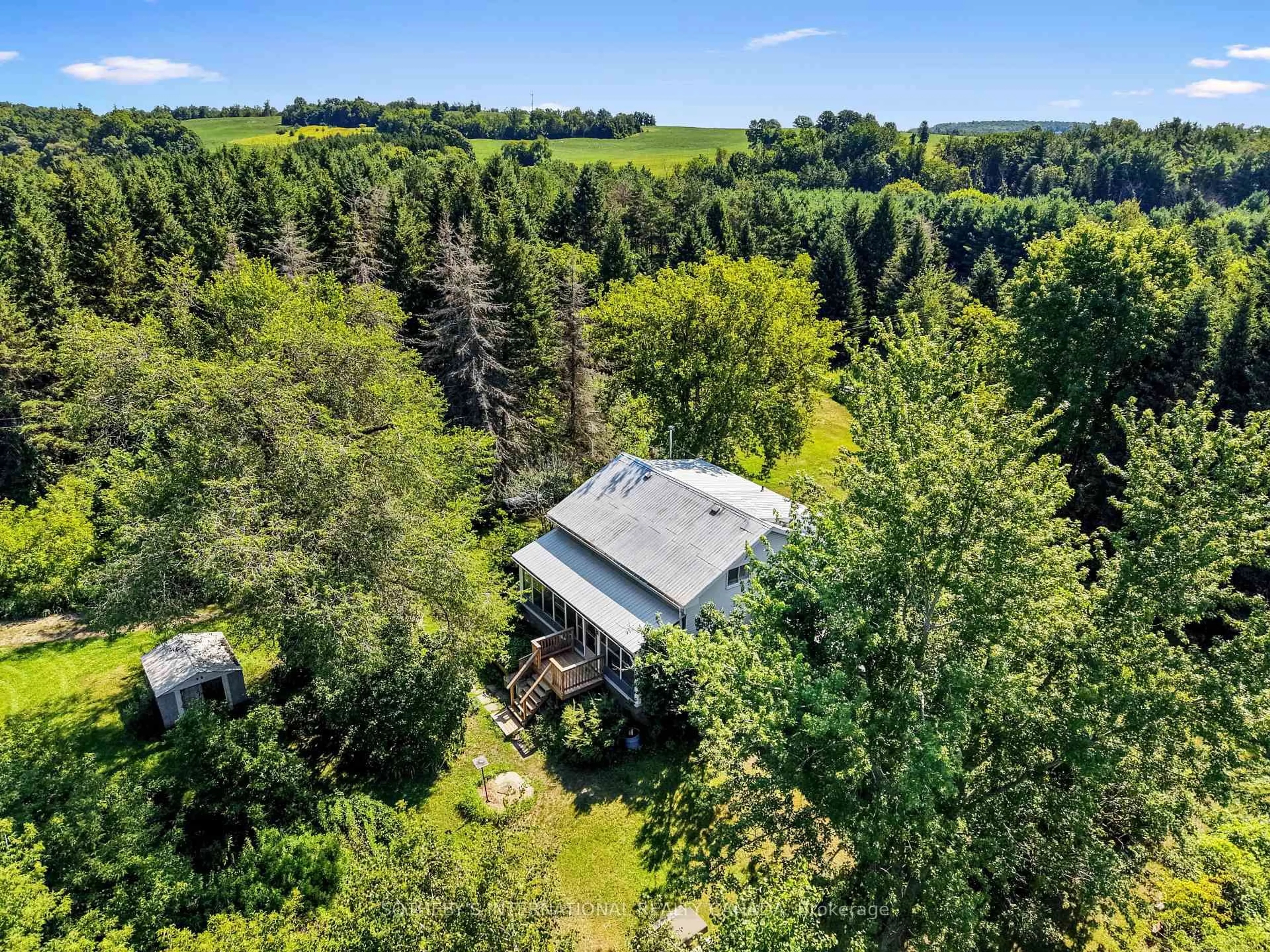 A pic from outside/outdoor area/front of a property/back of a property/a pic from drone, forest/trees view for 499 Concession Rd 4 East Rd, Trent Hills Ontario K0K 3K0