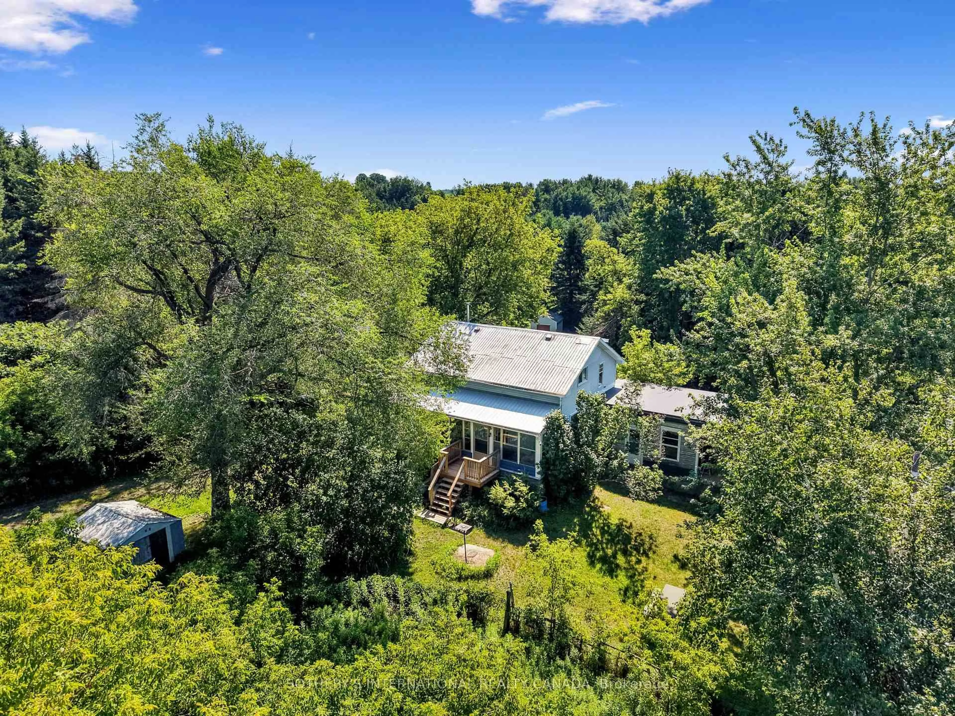 A pic from outside/outdoor area/front of a property/back of a property/a pic from drone, forest/trees view for 499 Concession Rd 4 East Rd, Trent Hills Ontario K0K 3K0
