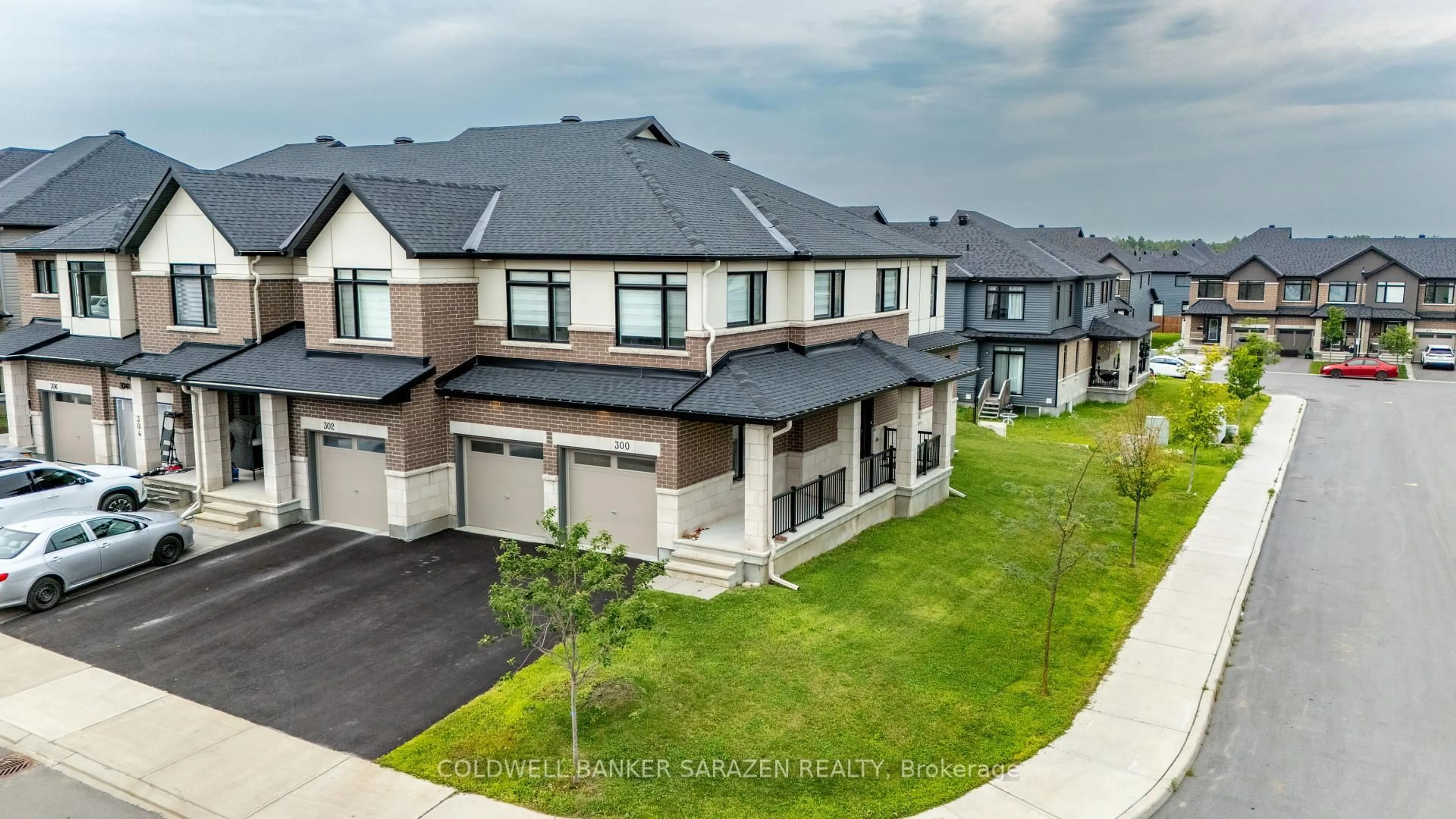 A pic from outside/outdoor area/front of a property/back of a property/a pic from drone, unknown for 300 ibanez Walk, Ottawa Ontario K1T 0V7