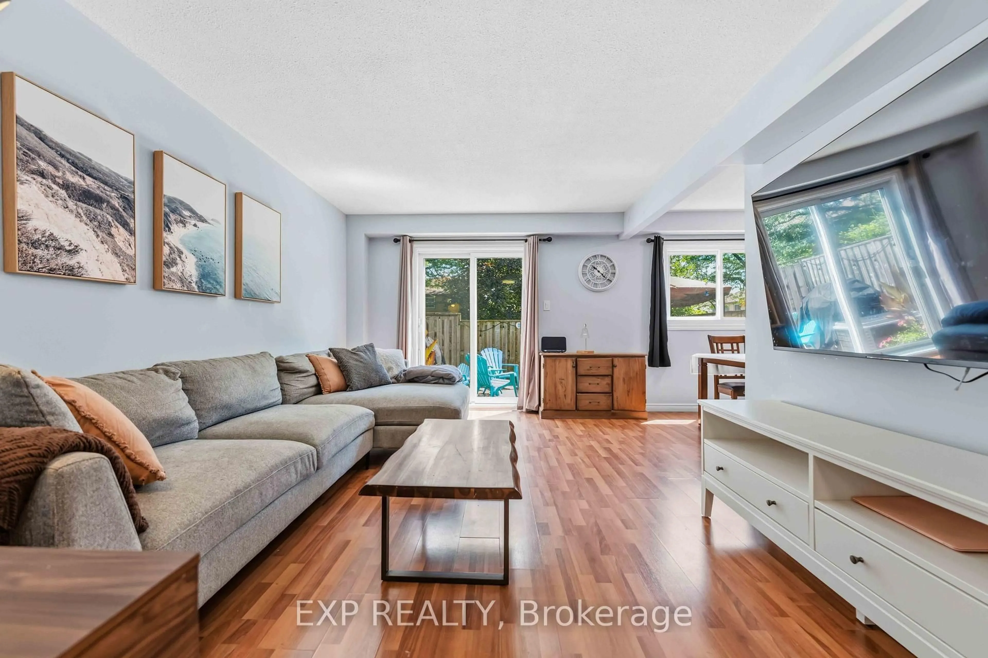 Living room with furniture, unknown for 2078 Orient Park Dr #52, Ottawa Ontario K1B 4V9