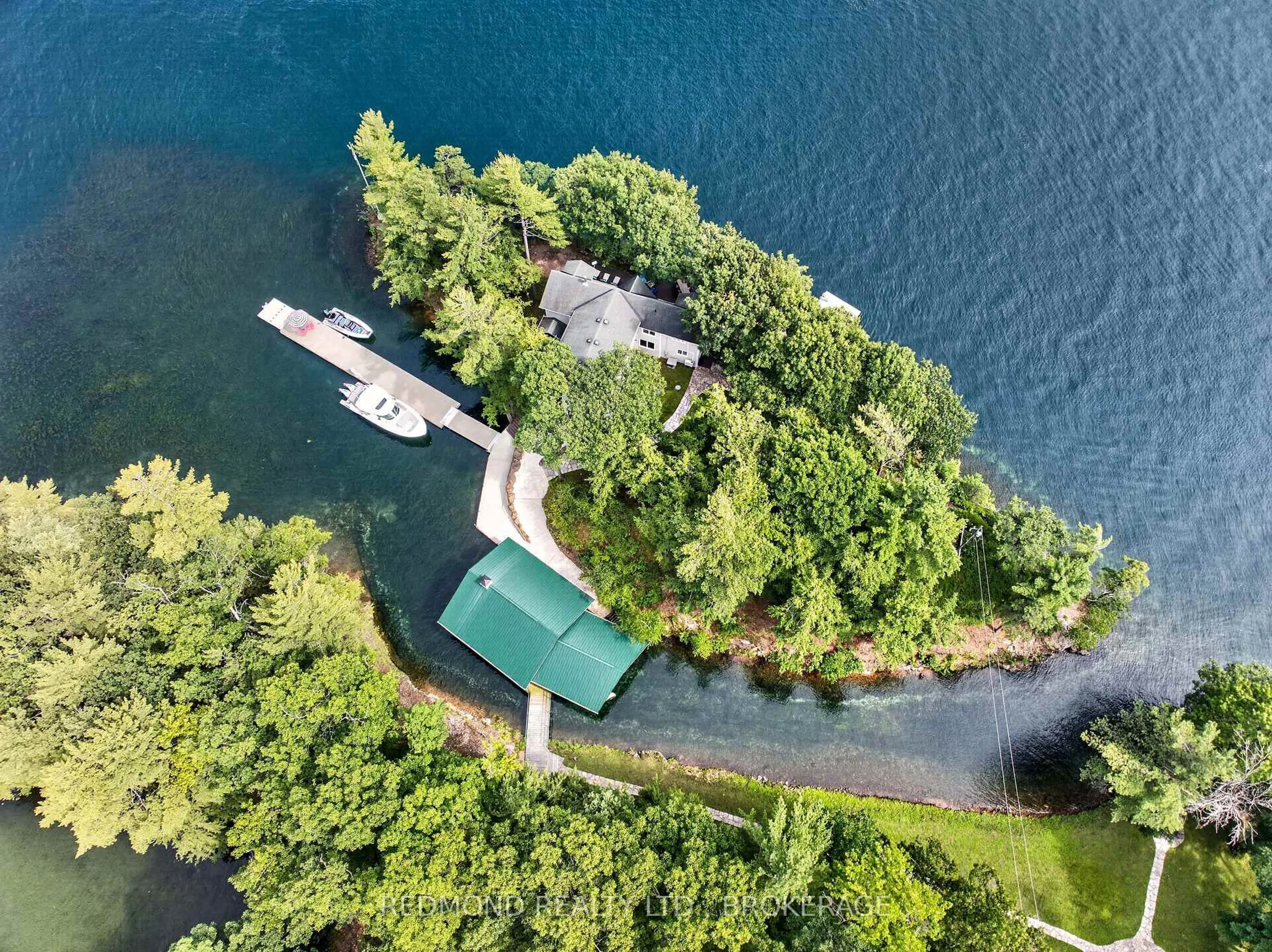 A pic from outside/outdoor area/front of a property/back of a property/a pic from drone, water/lake/river/ocean view for 245 Wallace Island, Leeds and the Thousand Islands Ontario K0E 1L0