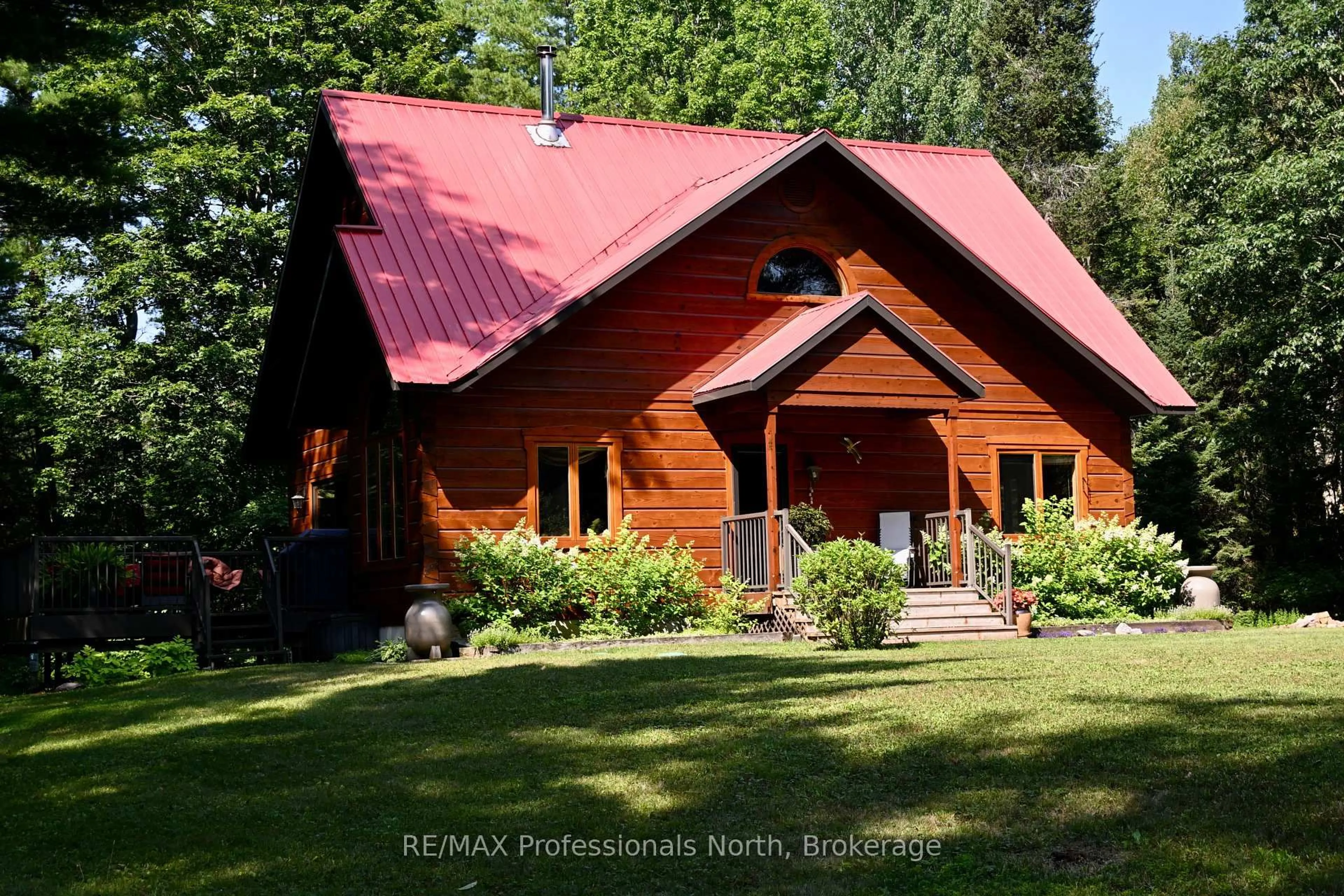 A pic from outside/outdoor area/front of a property/back of a property/a pic from drone, unknown for 242 Deer Lake Rd, Huntsville Ontario P0B 1L0