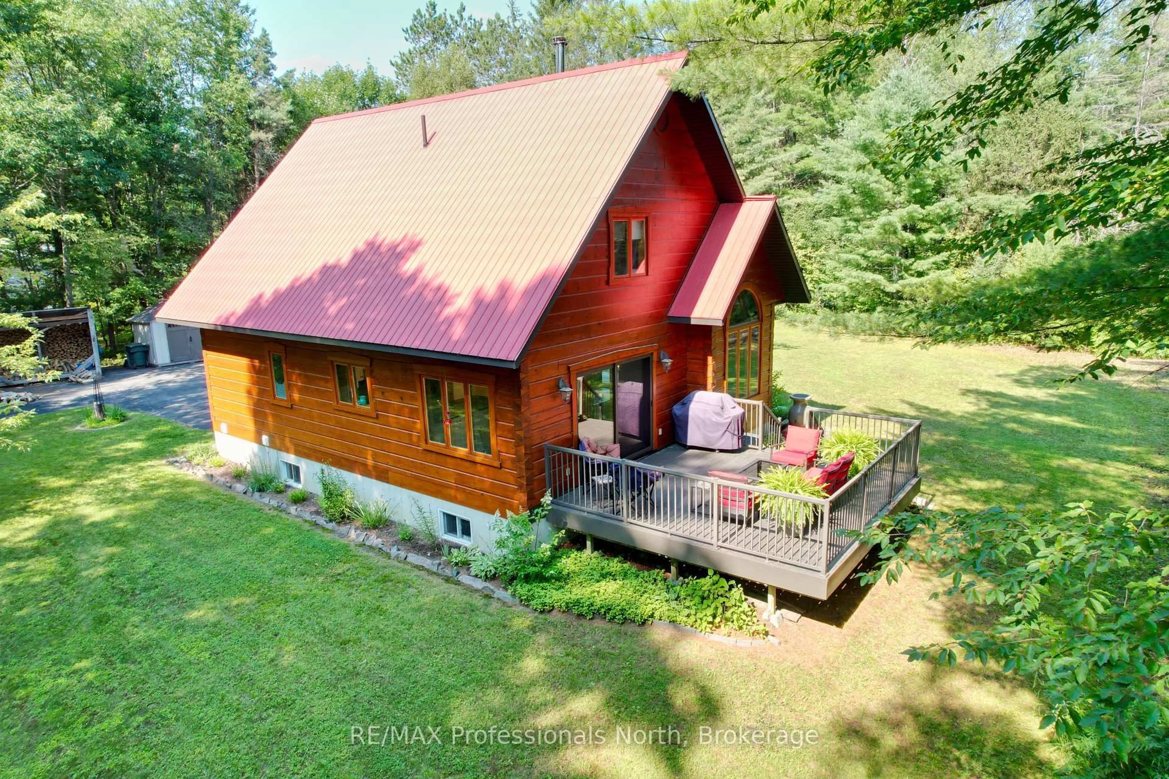 A pic from outside/outdoor area/front of a property/back of a property/a pic from drone, building for 242 Deer Lake Rd, Huntsville Ontario P0B 1L0