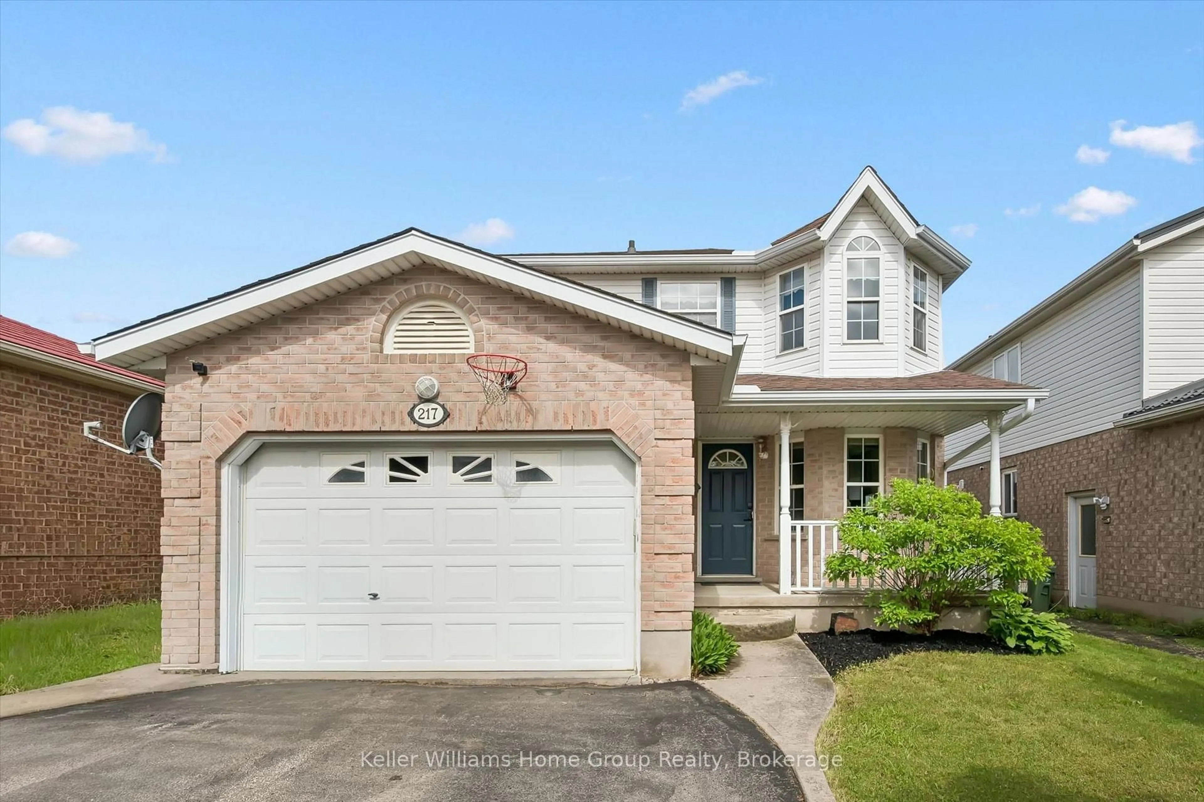 Home with brick exterior material, street for 217 Deerpath Dr, Guelph Ontario N1K 1W6