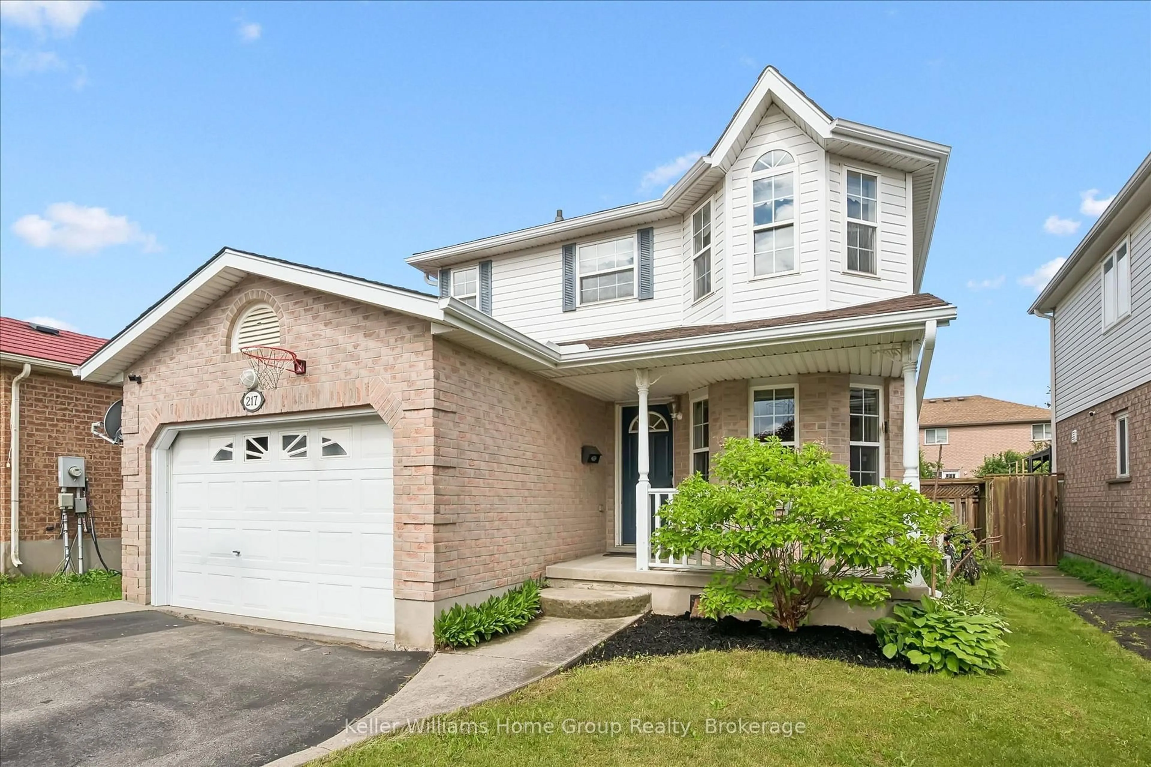 Home with brick exterior material, street for 217 Deerpath Dr, Guelph Ontario N1K 1W6