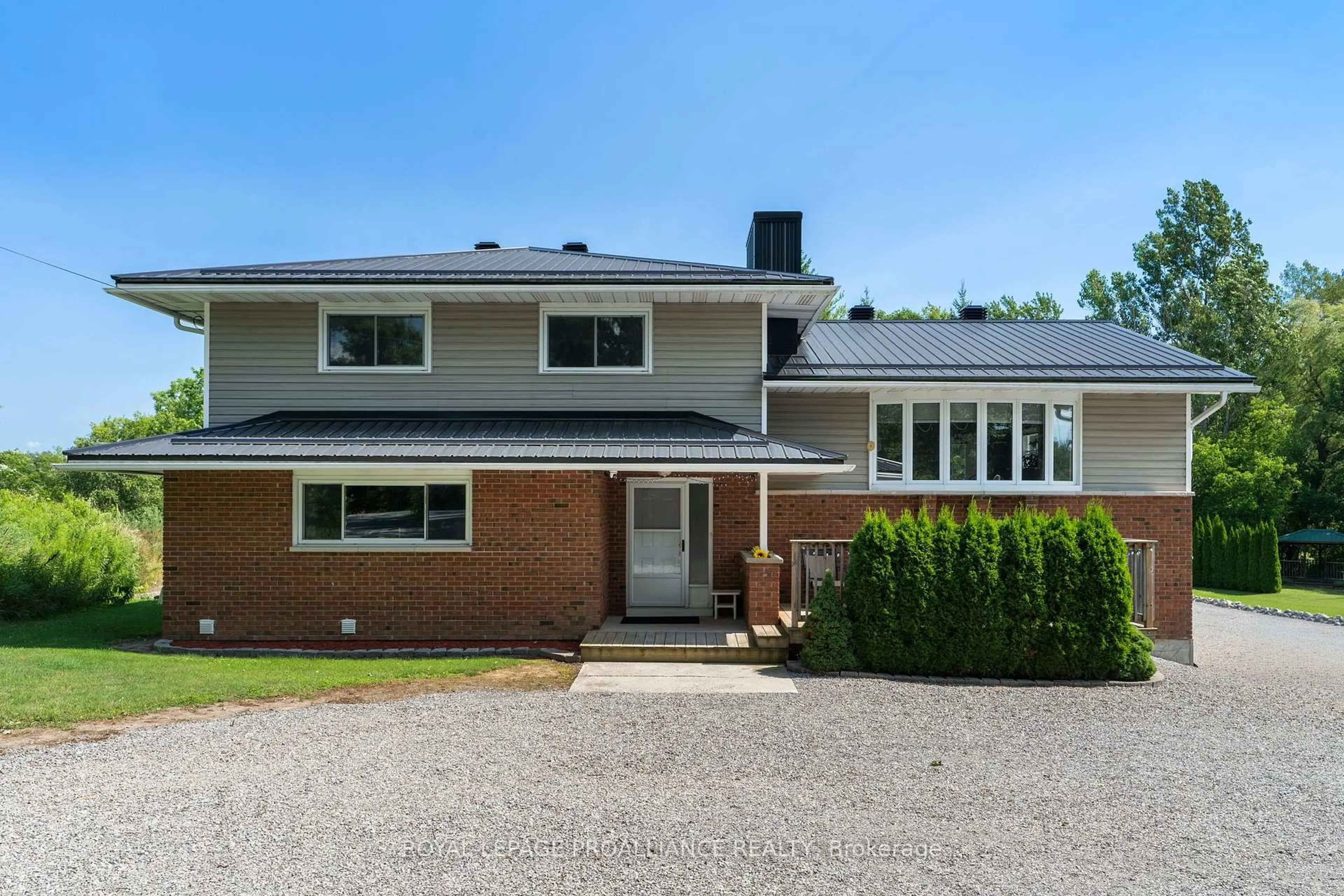 Home with brick exterior material, street for 1321 County Road 2 Rd, Leeds and the Thousand Islands Ontario K0E 1R0
