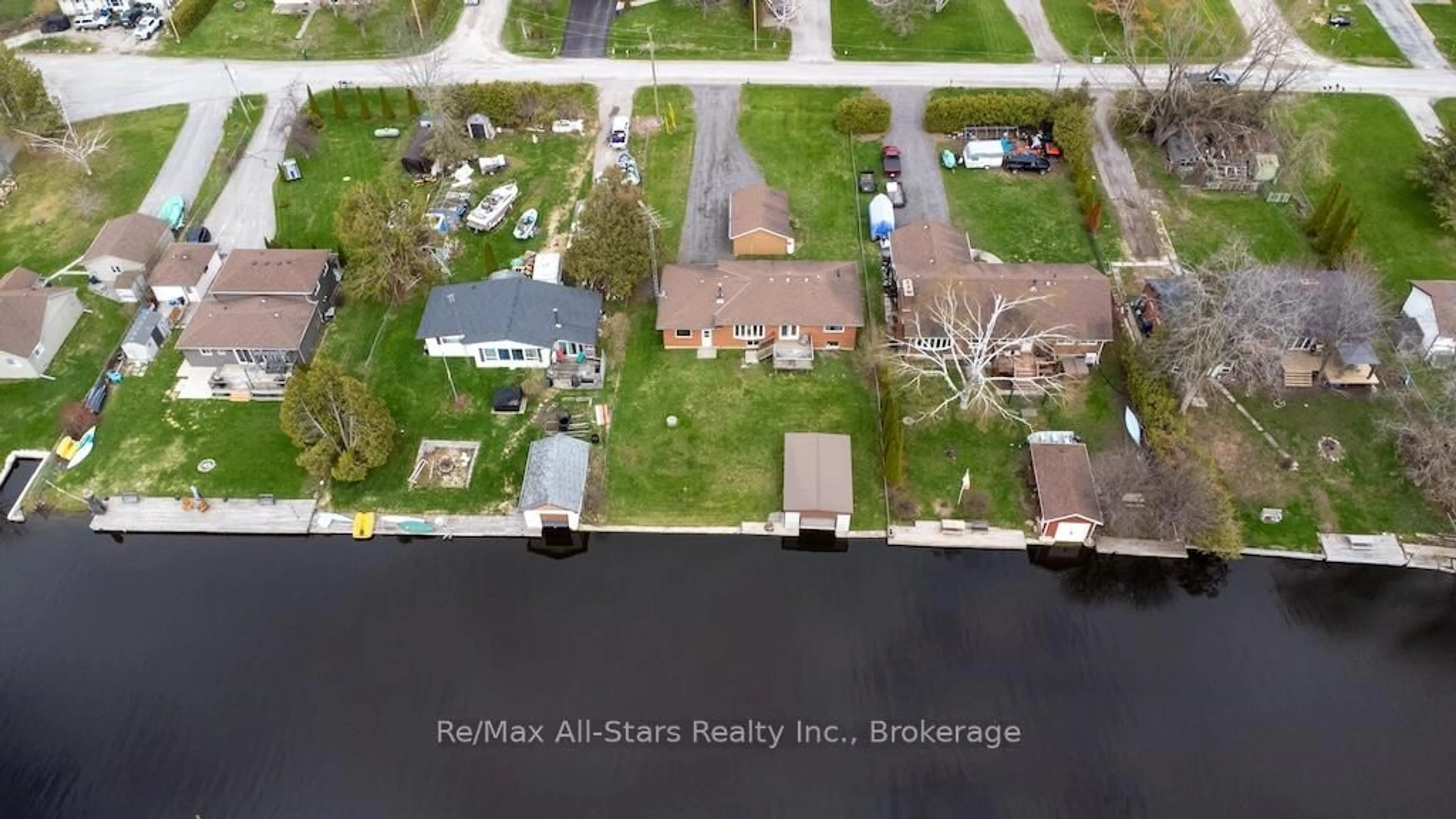 A pic from outside/outdoor area/front of a property/back of a property/a pic from drone, water/lake/river/ocean view for 57 Indian Tr, Kawartha Lakes Ontario K9V 4R6