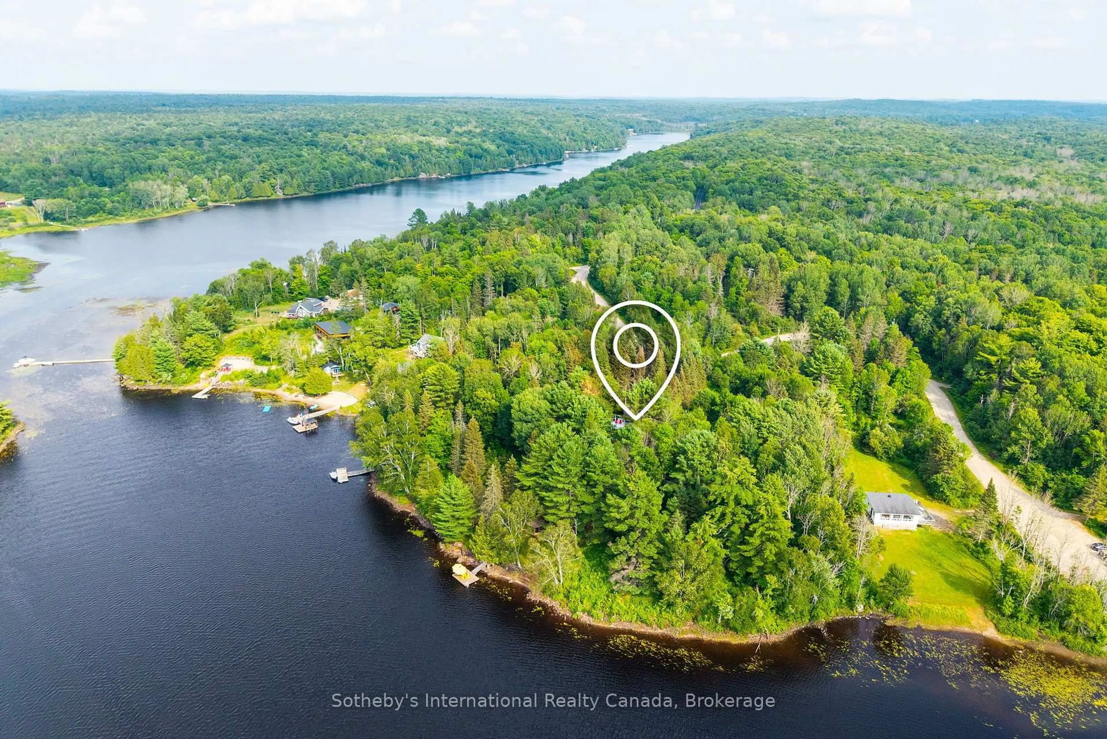 A pic from outside/outdoor area/front of a property/back of a property/a pic from drone, water/lake/river/ocean view for 13 Pine Tree Rd, Magnetawan Ontario P0A 1P0