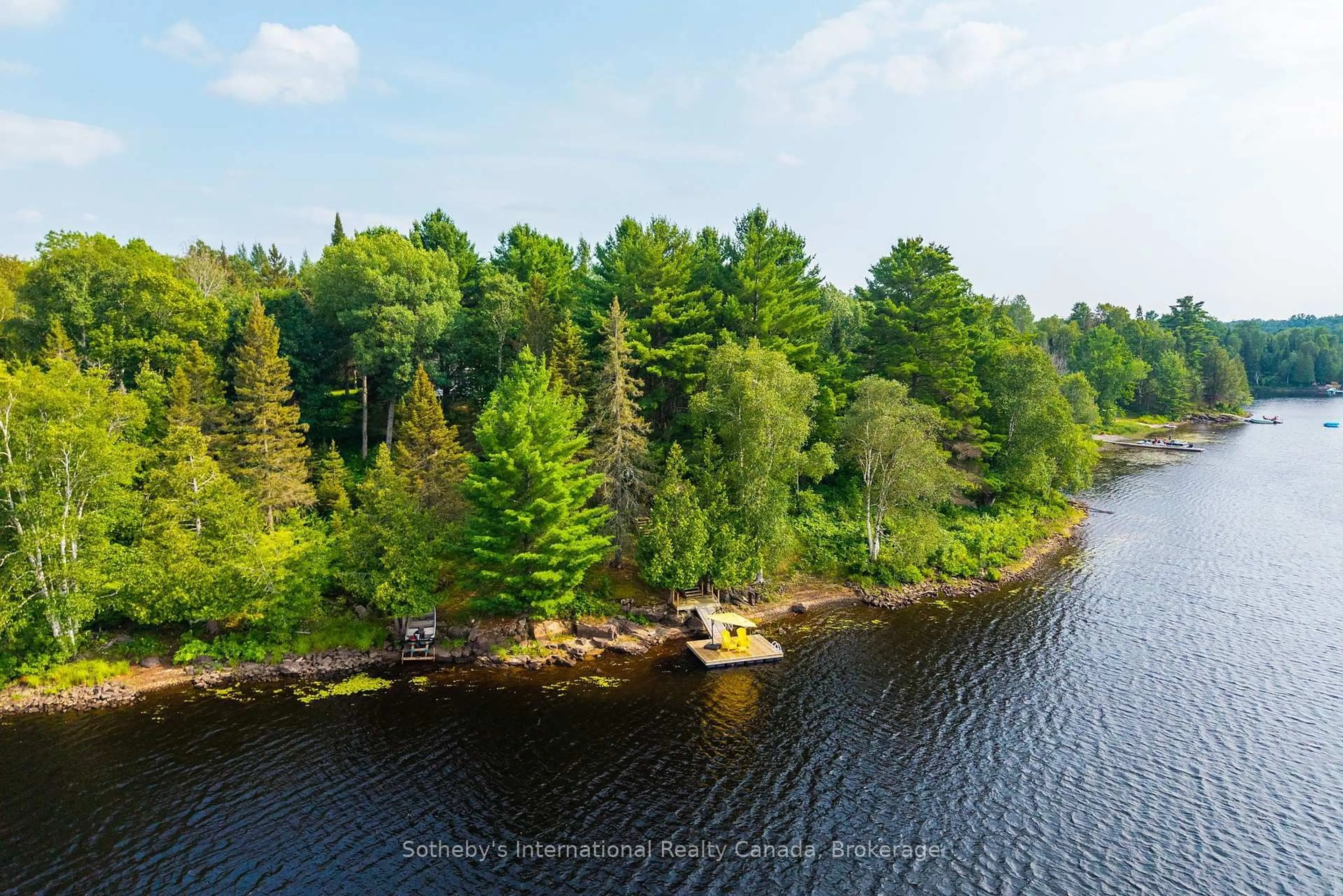 A pic from outside/outdoor area/front of a property/back of a property/a pic from drone, water/lake/river/ocean view for 13 Pine Tree Rd, Magnetawan Ontario P0A 1P0