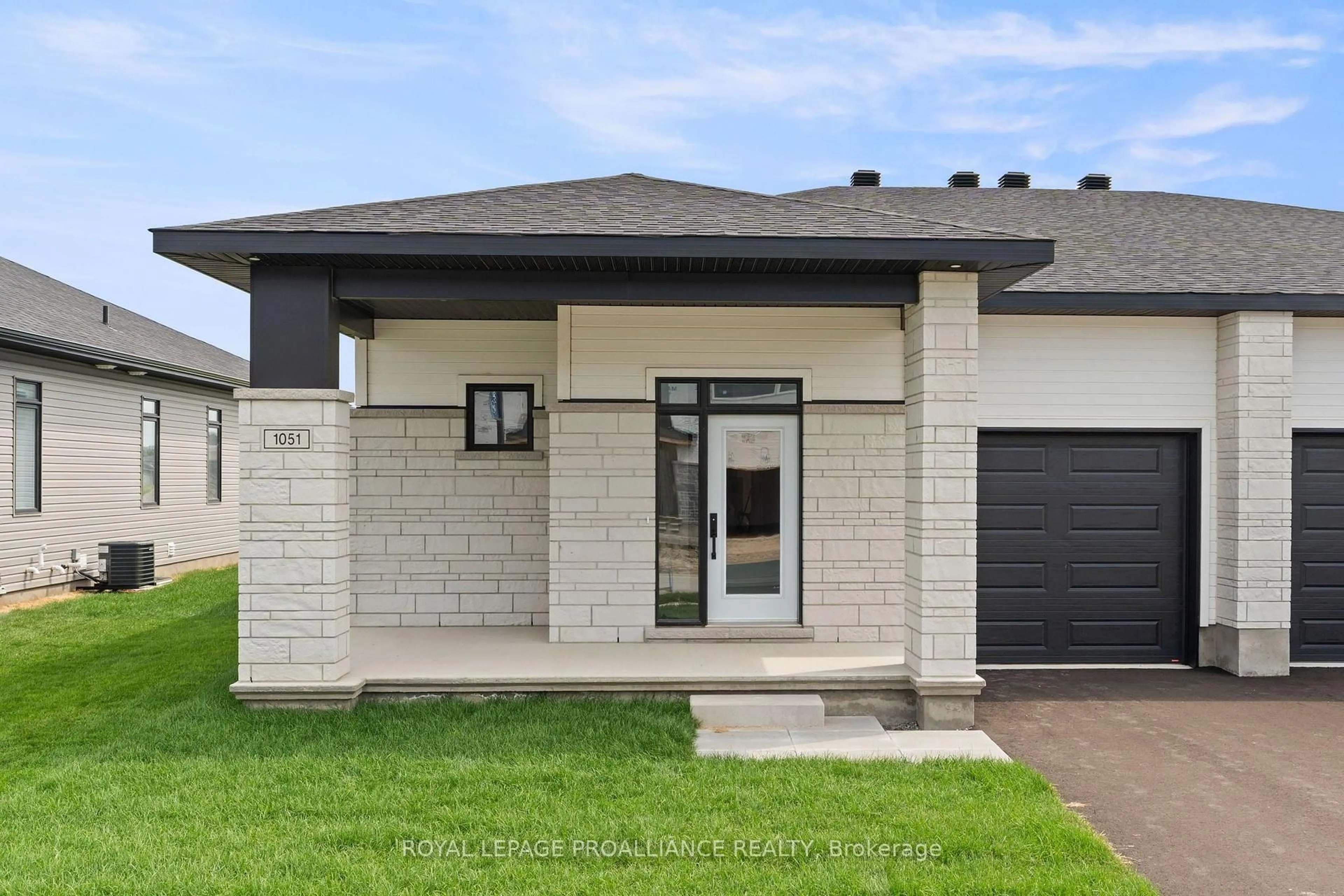 Home with brick exterior material, street for 1051 Moore St, Brockville Ontario K6V 0H1