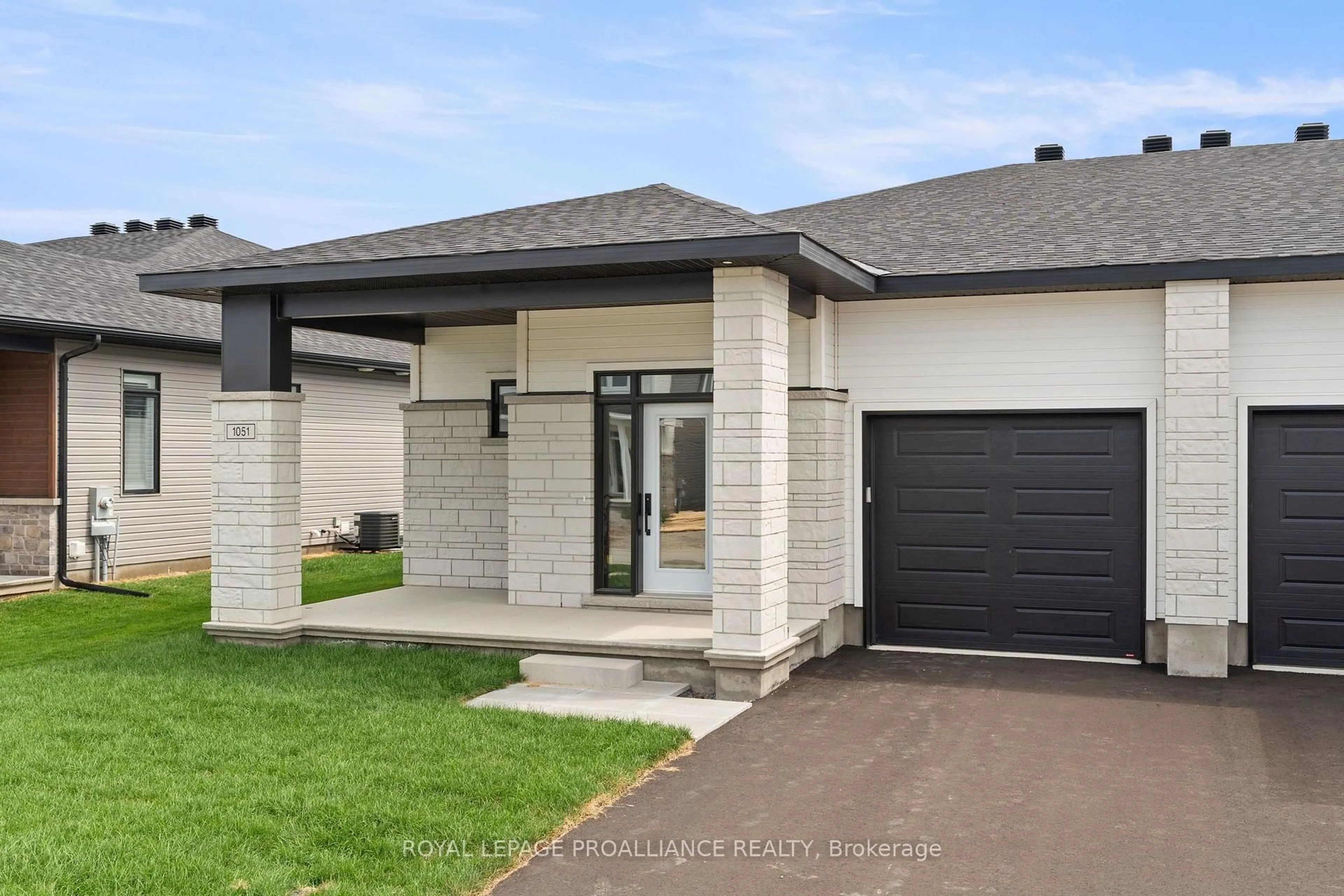 Home with brick exterior material, street for 1051 Moore St, Brockville Ontario K6V 0H1