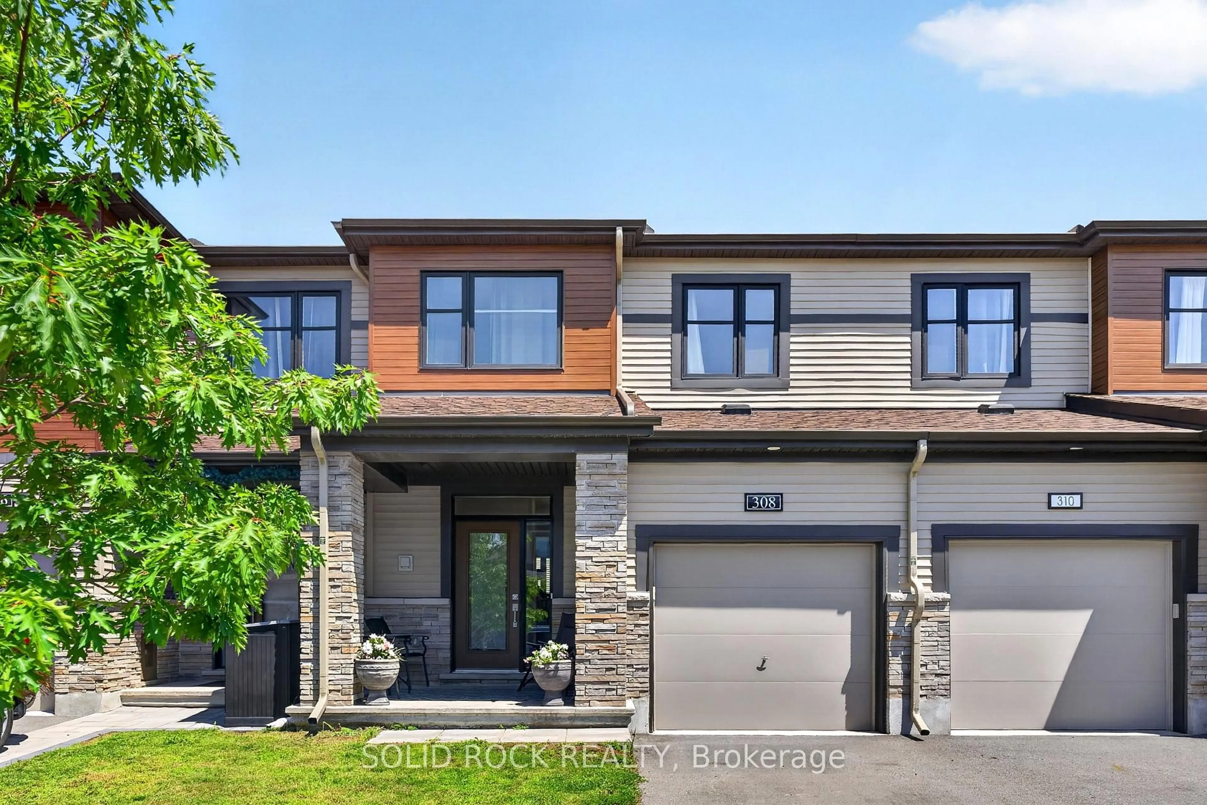 Home with brick exterior material, street for 308 Drumlish Lane, Ottawa Ontario K2J 6Y1