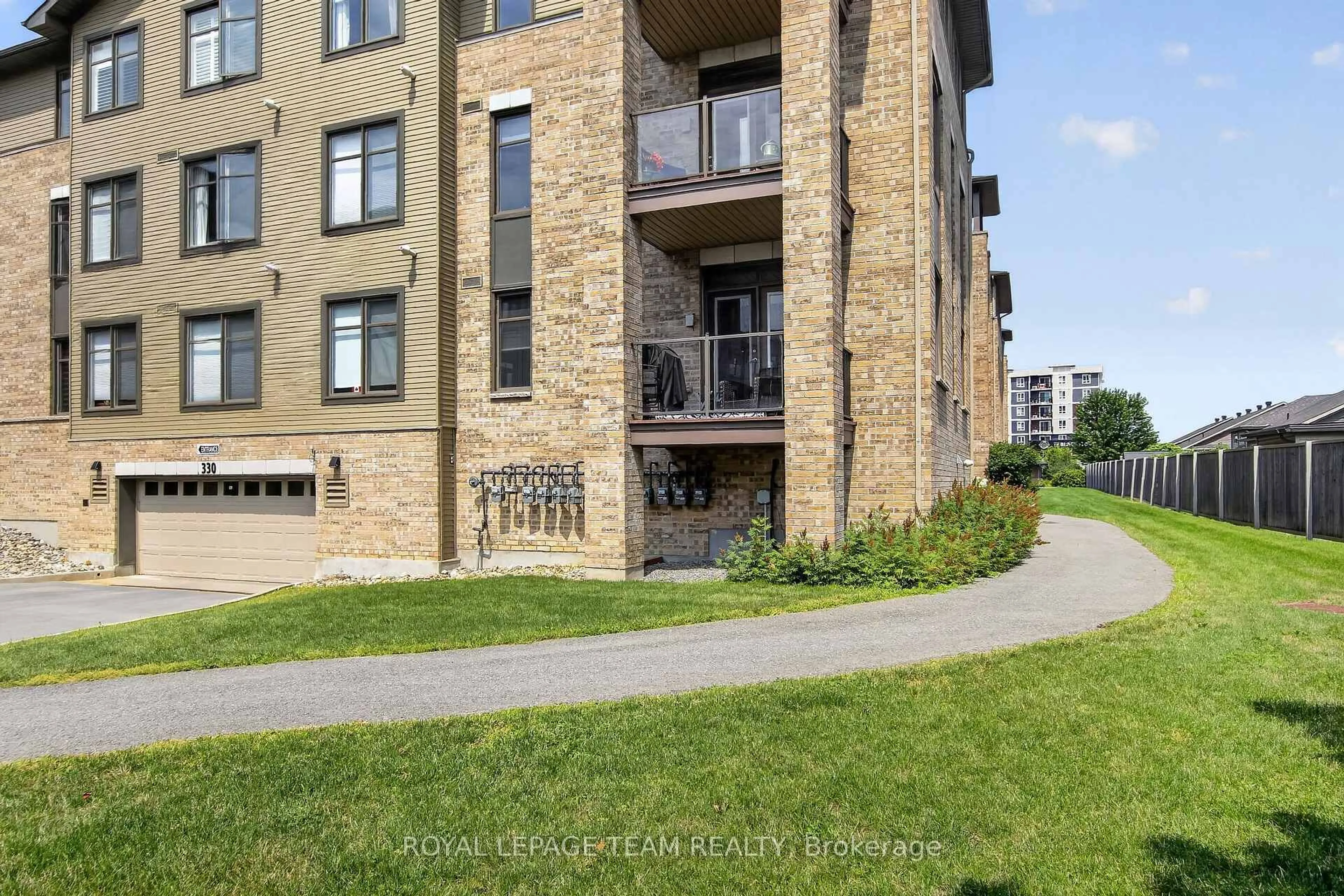 A pic from outside/outdoor area/front of a property/back of a property/a pic from drone, unknown for 330 Jatoba Private #203, Ottawa Ontario K2V 0E7