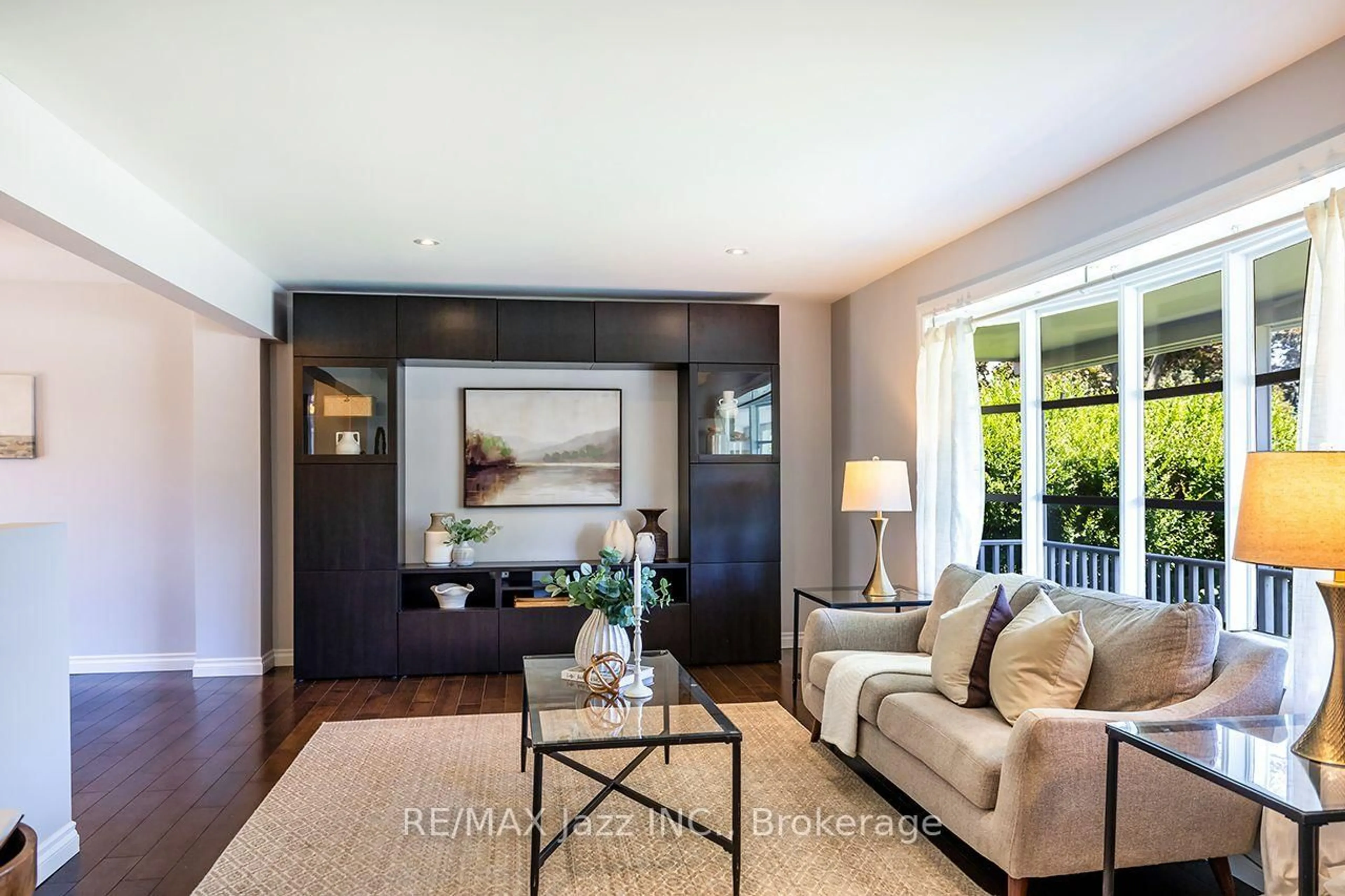 Living room with furniture, wood/laminate floor for 149 Abbott Blvd, Cobourg Ontario K9A 4E5
