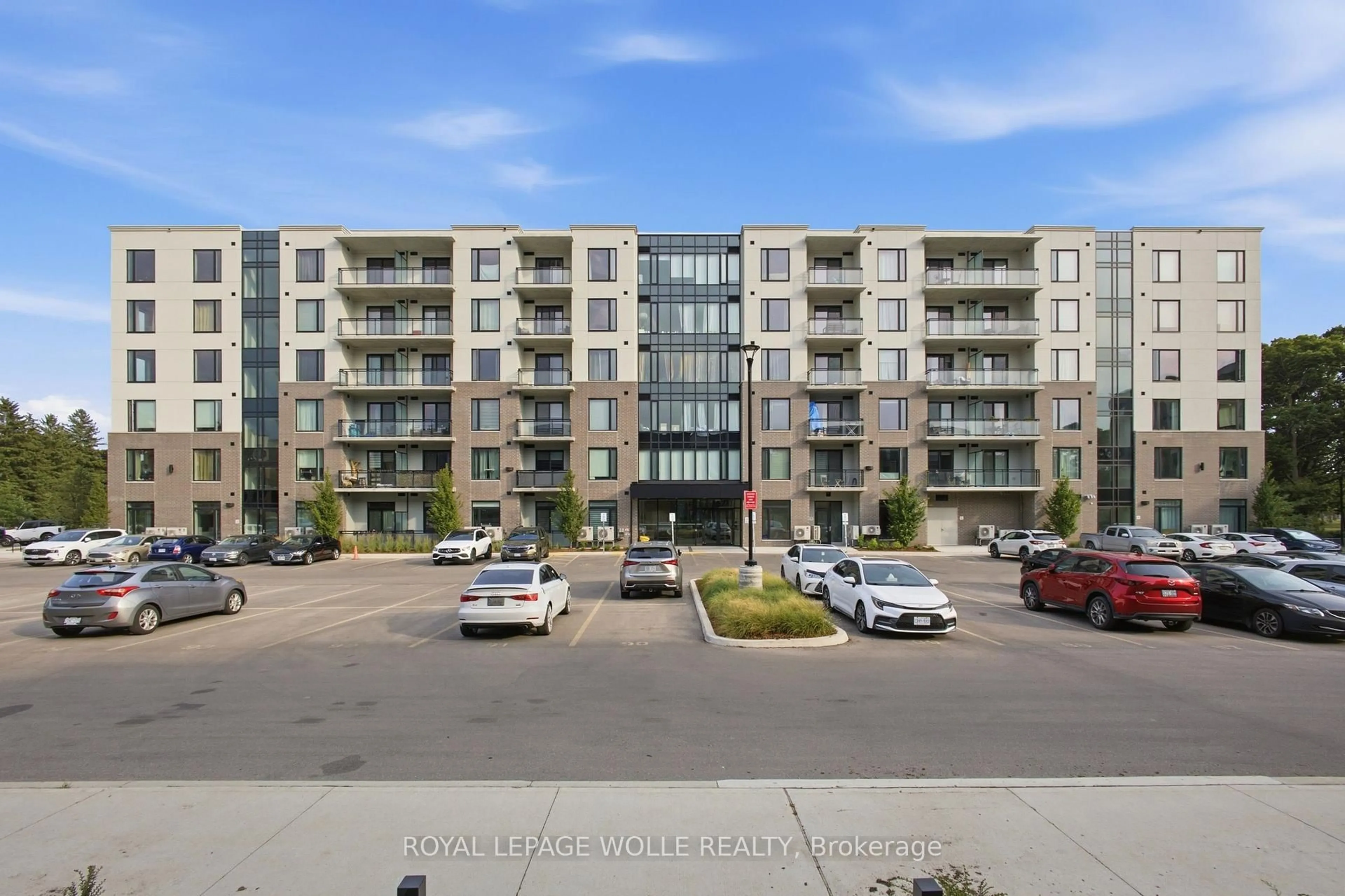 A pic from outside/outdoor area/front of a property/back of a property/a pic from drone, unknown for 107 Roger St #308, Waterloo Ontario N2J 0G2