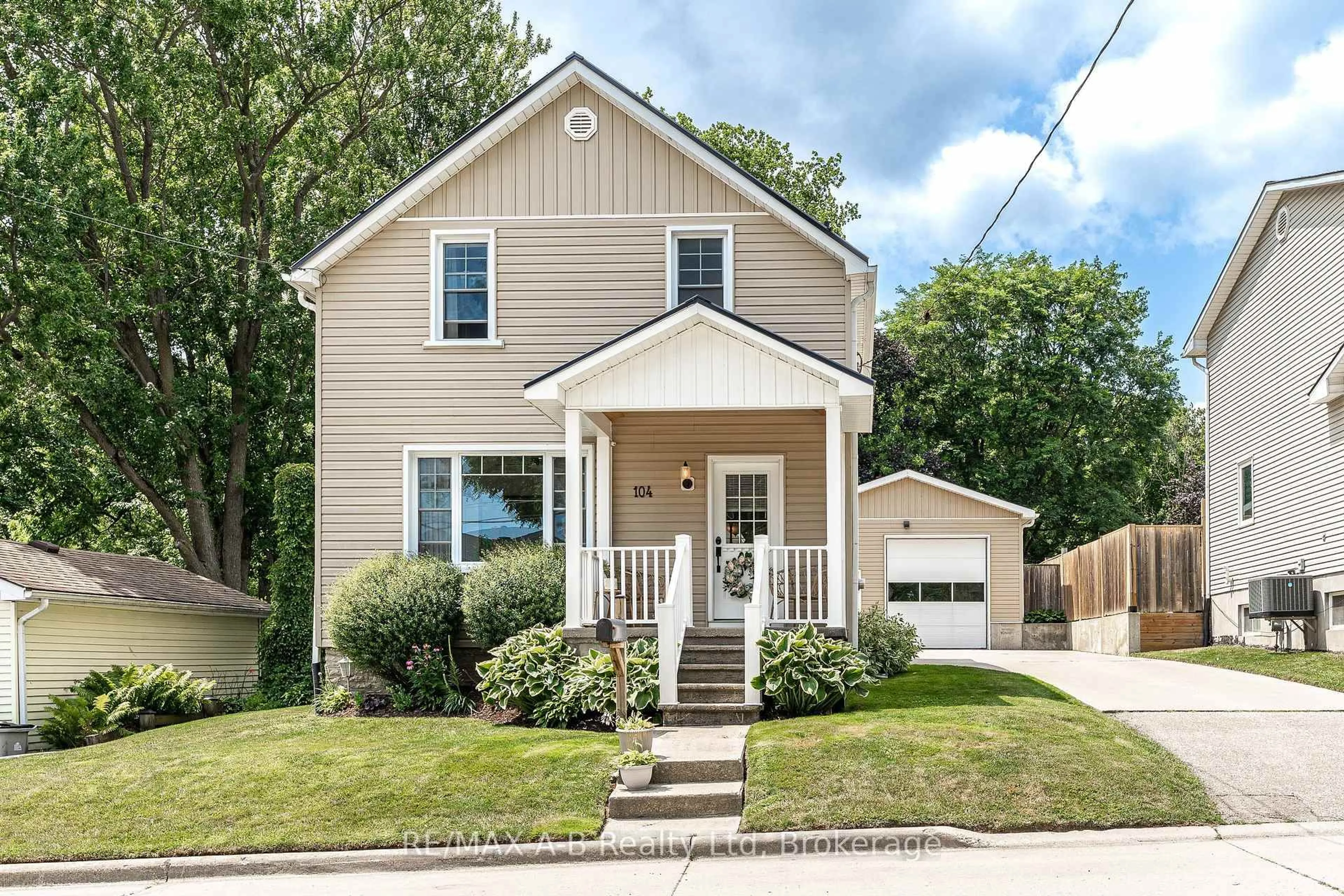 Home with vinyl exterior material, street for 104 Ontario St, St. Marys Ontario N4X 1C2