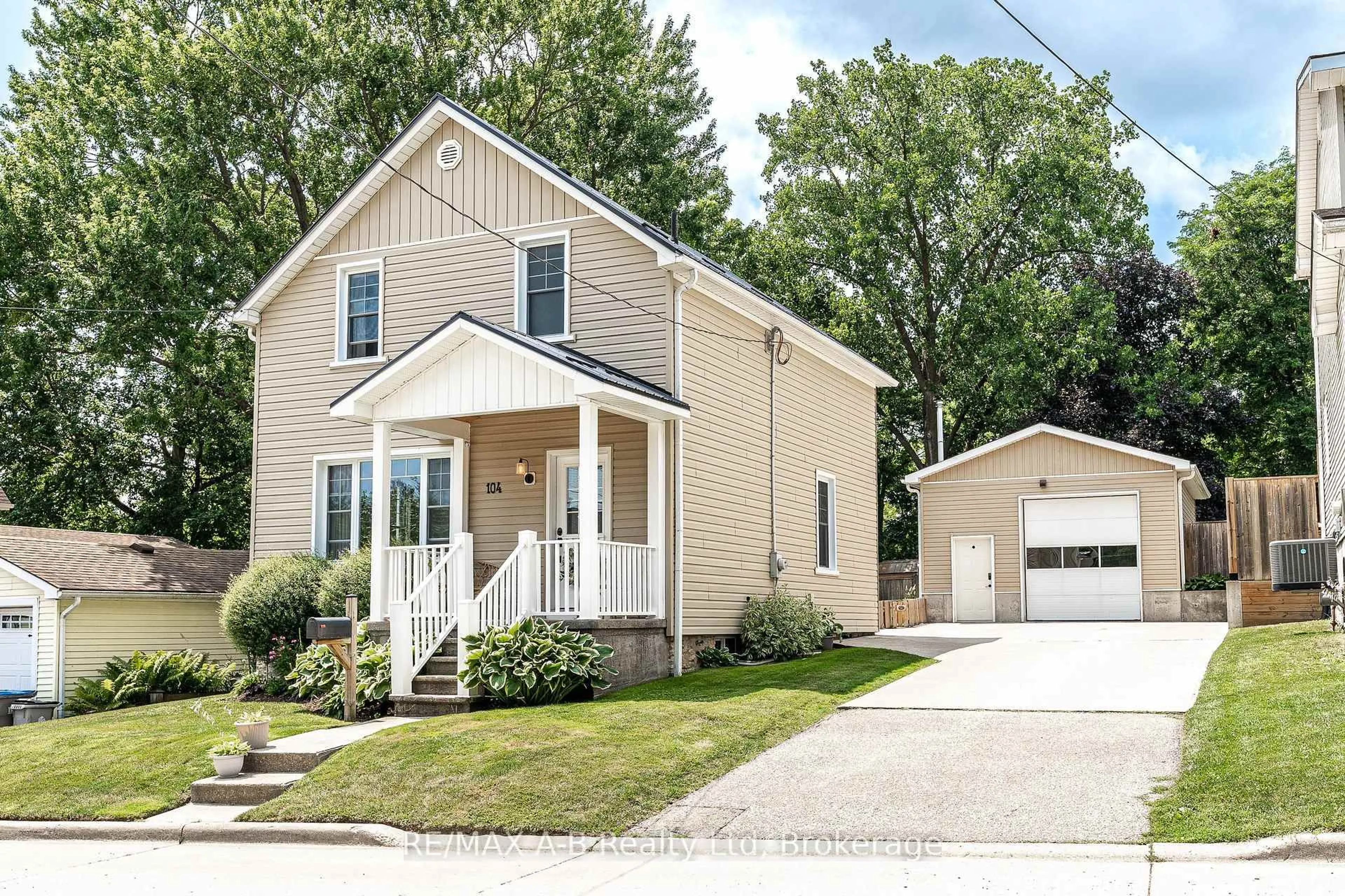 Home with vinyl exterior material, street for 104 Ontario St, St. Marys Ontario N4X 1C2
