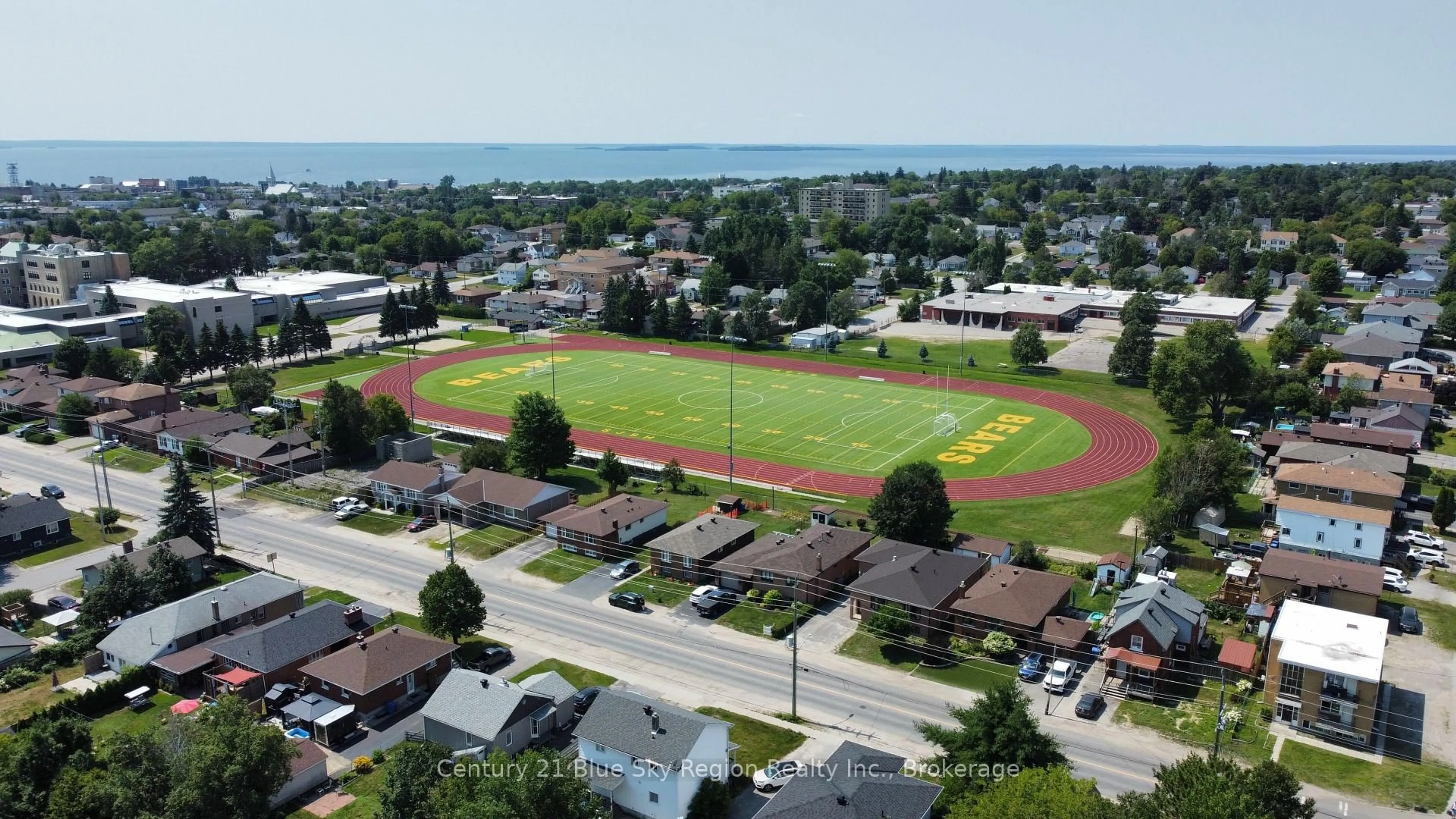 A pic from outside/outdoor area/front of a property/back of a property/a pic from drone, street for 877 O'Brien St, North Bay Ontario P1B 5W9