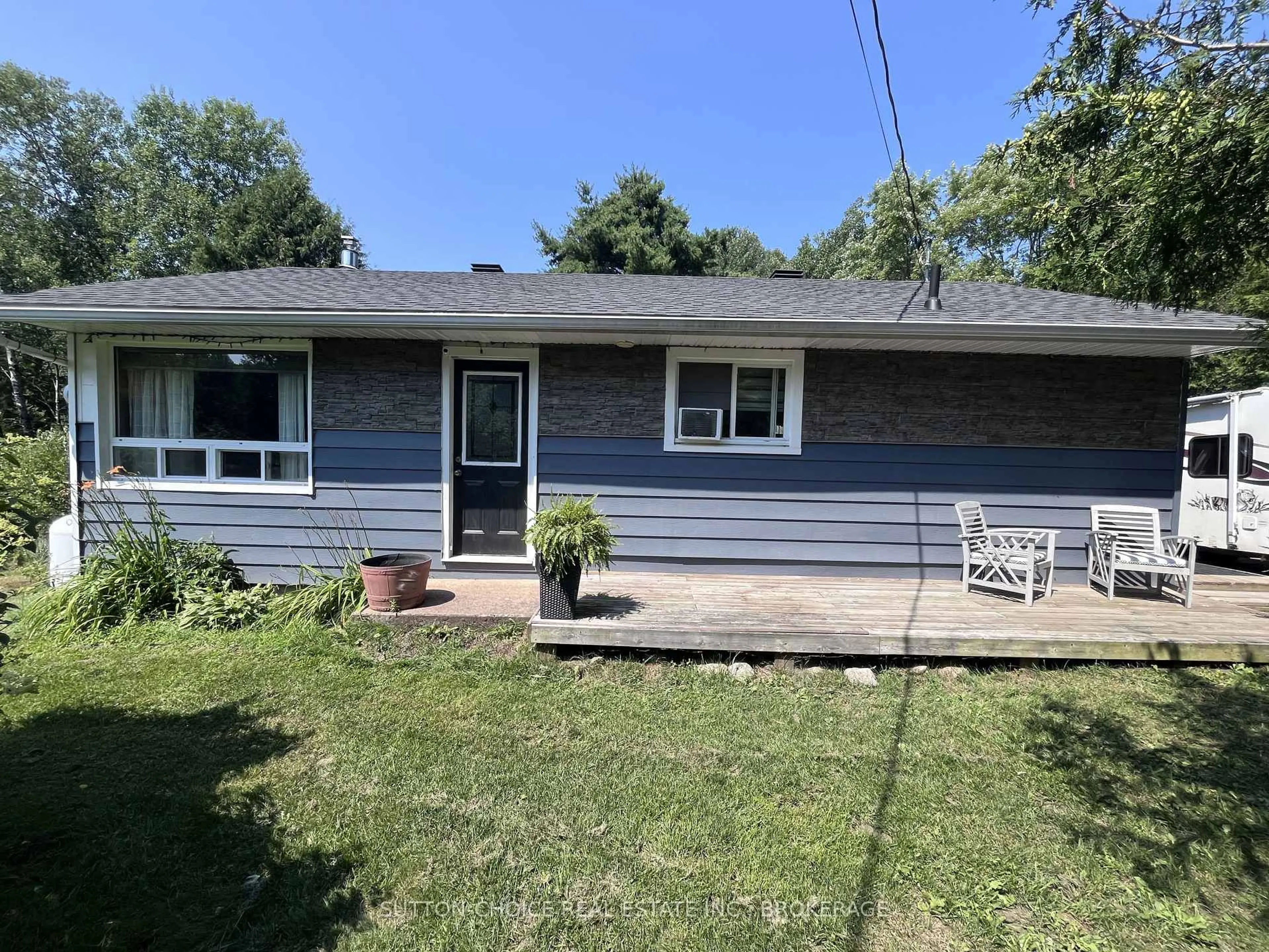 Home with vinyl exterior material, street for 594 Derland Rd, East Ferris Ontario P0H 1K0