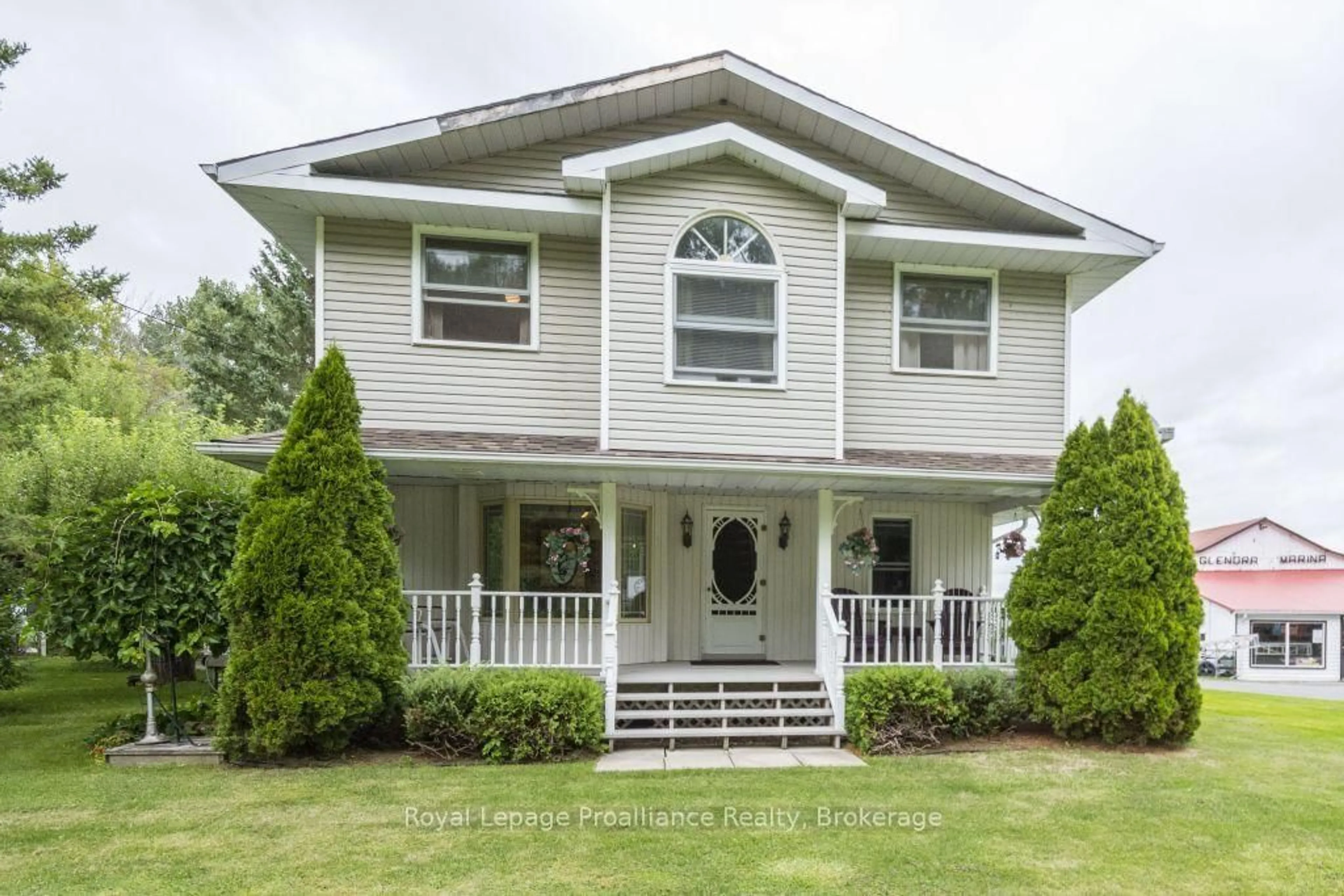 Home with vinyl exterior material, street for 11438C Loyalist Pkwy, Prince Edward County Ontario K0K 2T0