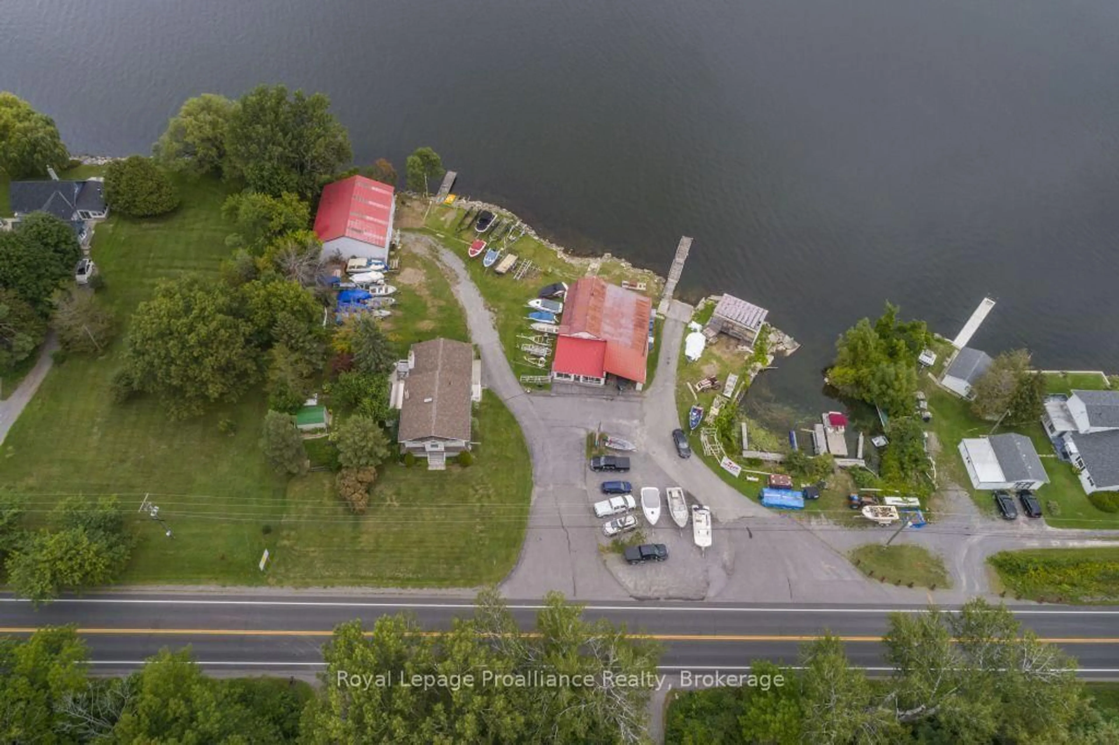 A pic from outside/outdoor area/front of a property/back of a property/a pic from drone, water/lake/river/ocean view for 11438C Loyalist Pkwy, Prince Edward County Ontario K0K 2T0