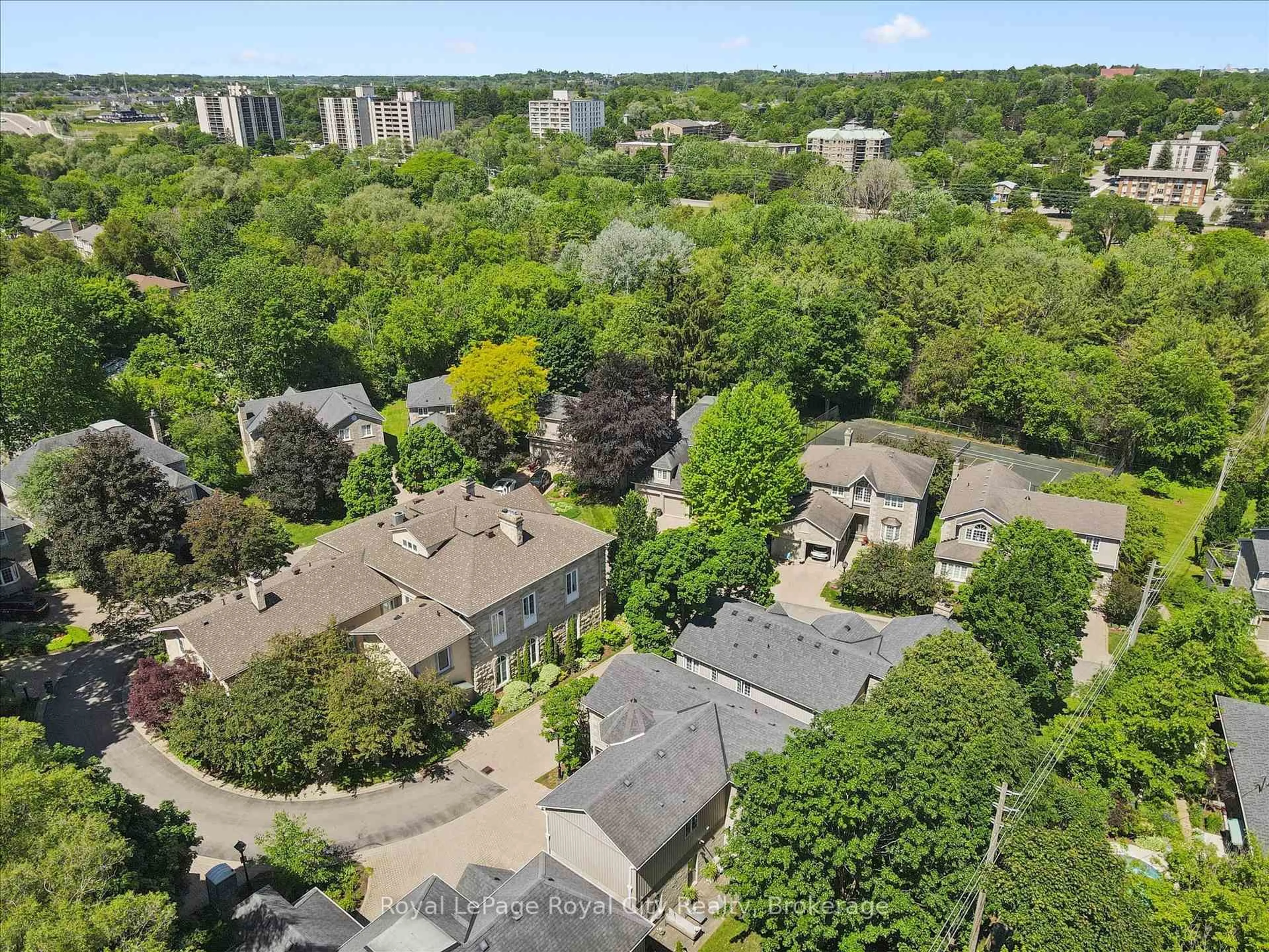 A pic from outside/outdoor area/front of a property/back of a property/a pic from drone, street for 25 MANOR PARK Cres #11, Guelph Ontario N1G 1A2
