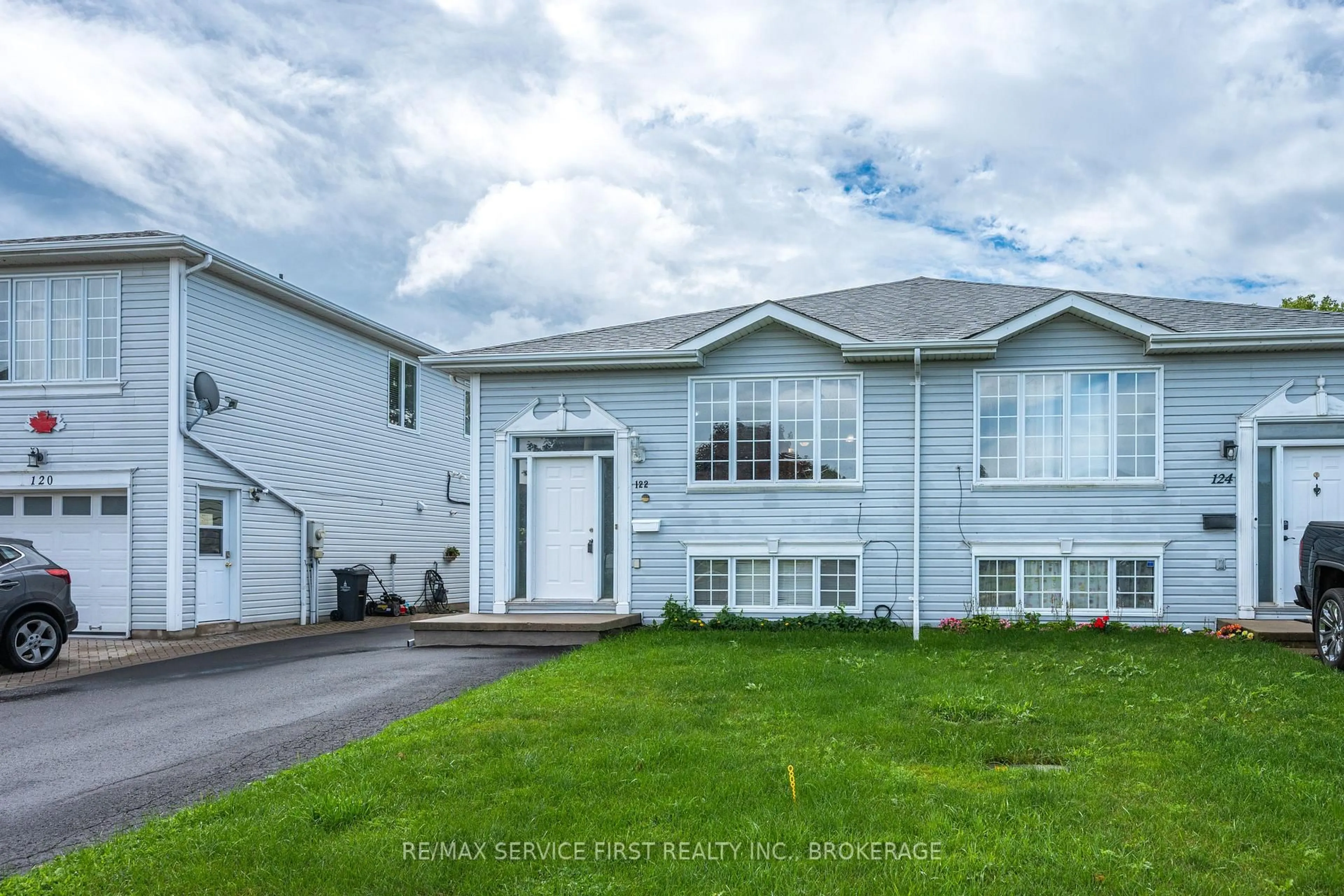 Home with vinyl exterior material, street for 122 Briceland St, Kingston Ontario K7K 7L2