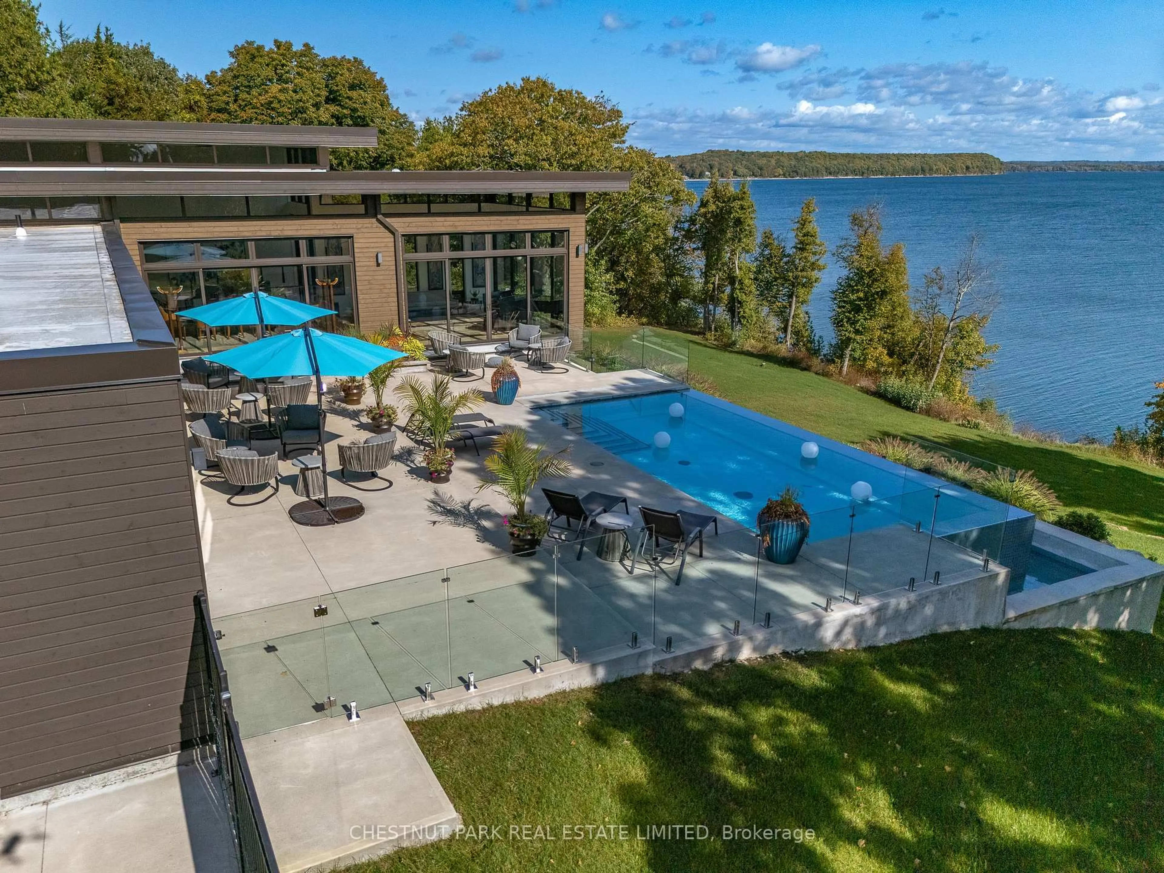 A pic from outside/outdoor area/front of a property/back of a property/a pic from drone, water/lake/river/ocean view for 1641 County Road 13, Prince Edward County Ontario K0K 2P0