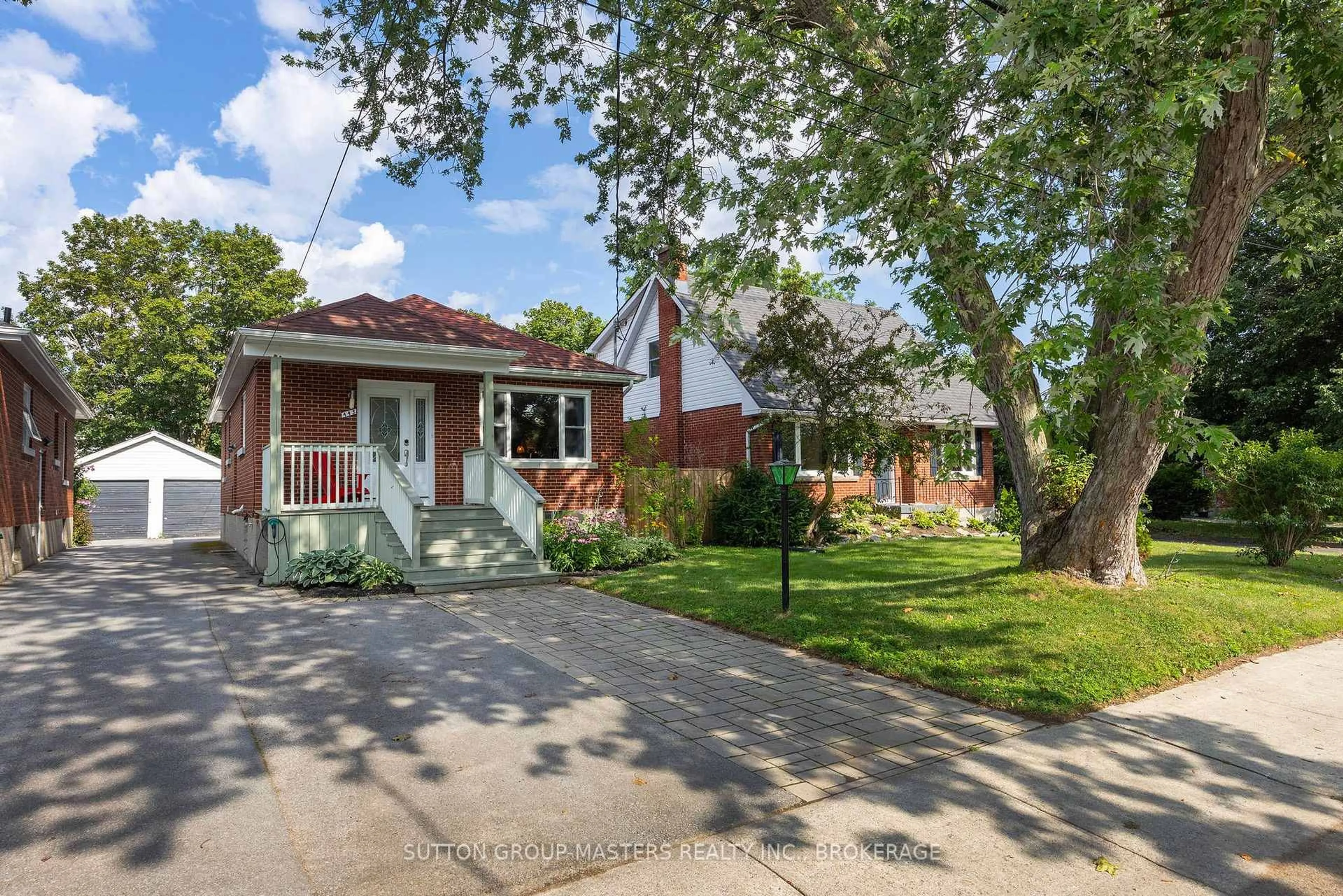 Home with brick exterior material, street for 443 College St, Kingston Ontario K7L 4M8