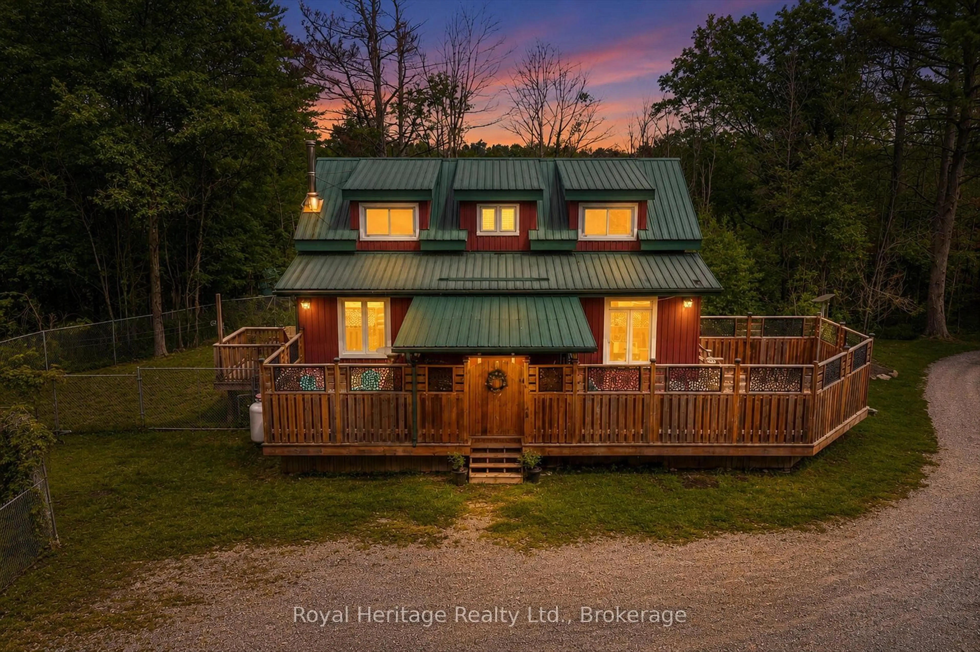A pic from outside/outdoor area/front of a property/back of a property/a pic from drone, unknown for 82 Kennedy Dr, Trent Lakes Ontario K0M 1A0
