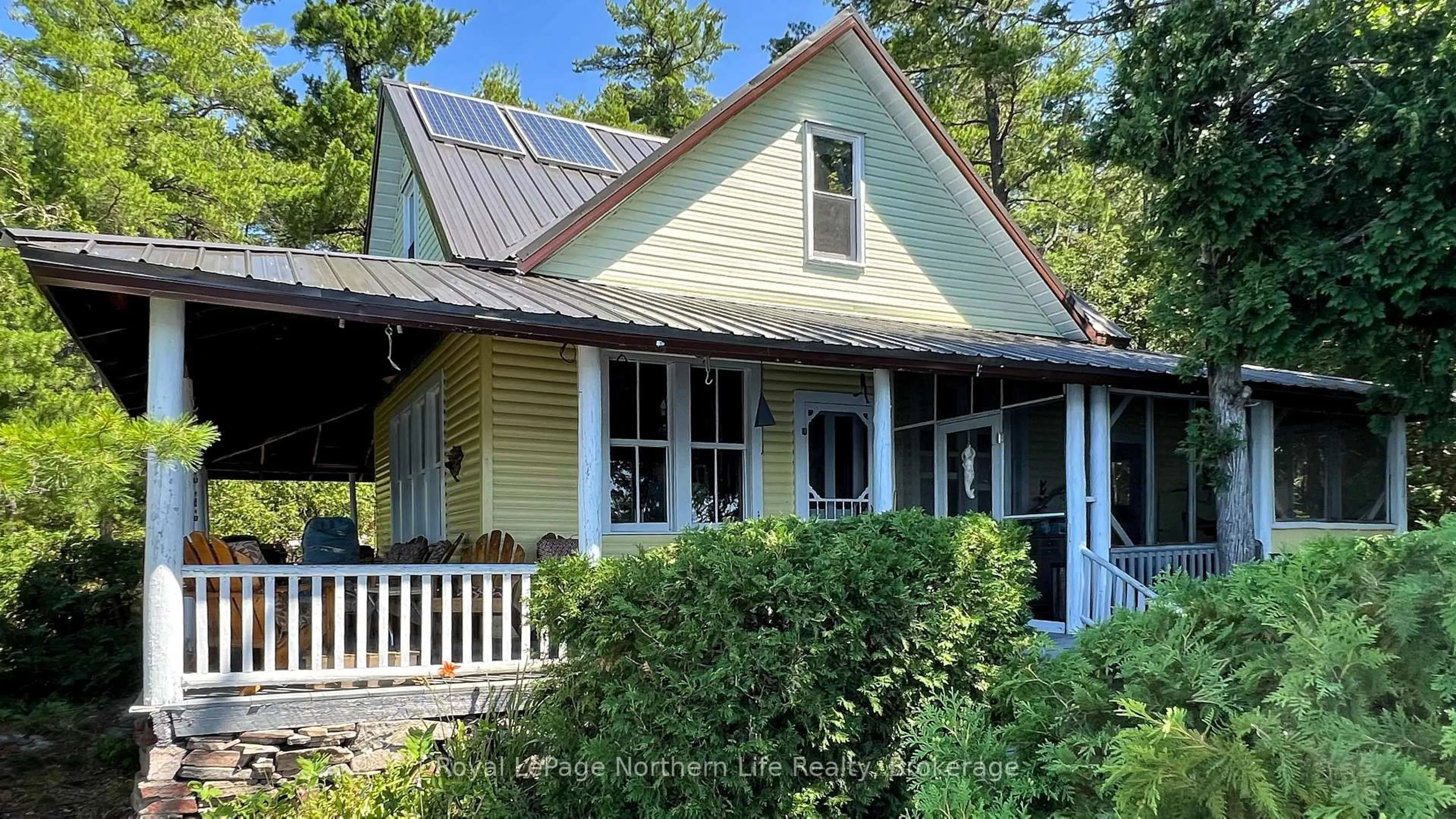 Home with vinyl exterior material, street for 140 Norris Island, Parry Sound Remote Area Ontario P0M 2N1