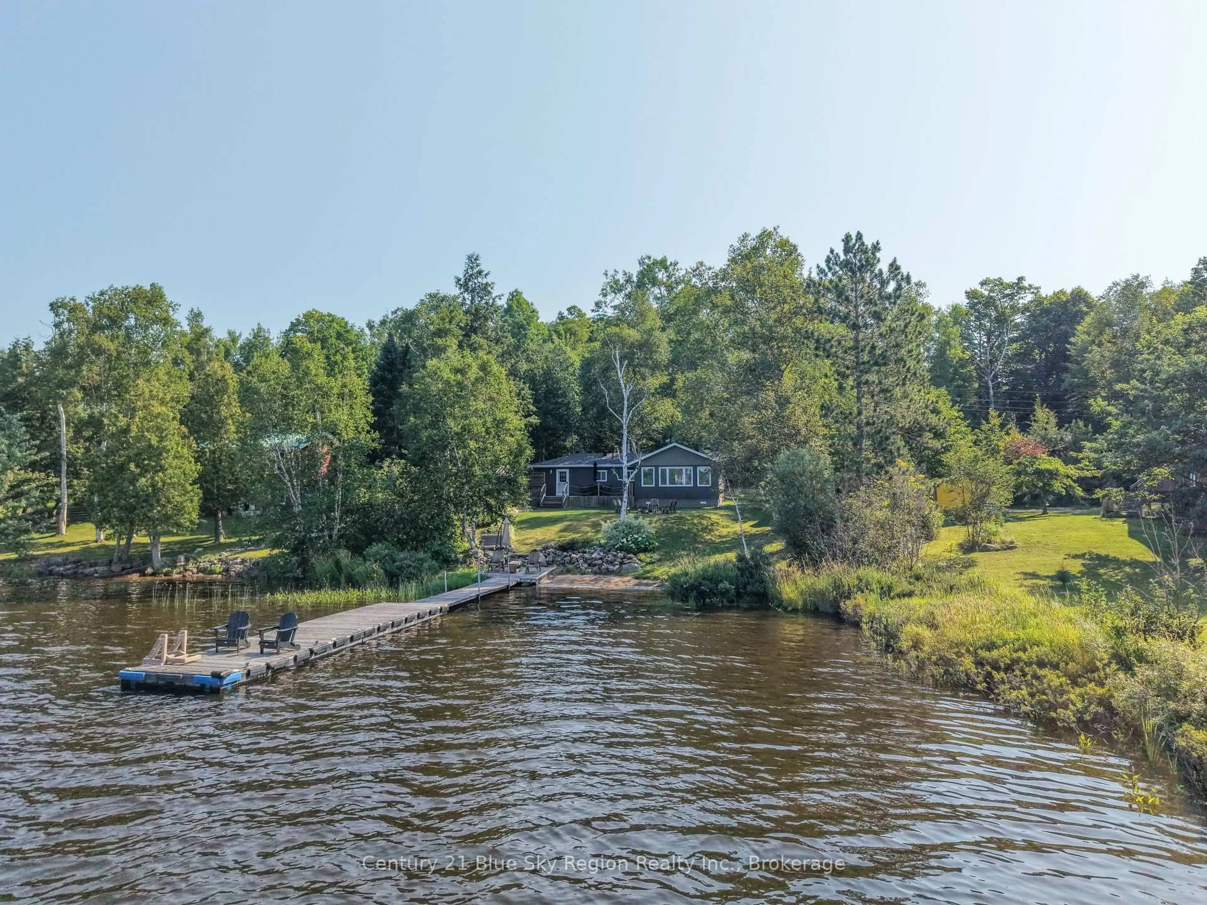 A pic from outside/outdoor area/front of a property/back of a property/a pic from drone, water/lake/river/ocean view for 485 Mallard Haven Rd, Chisholm Ontario P0H 1B0