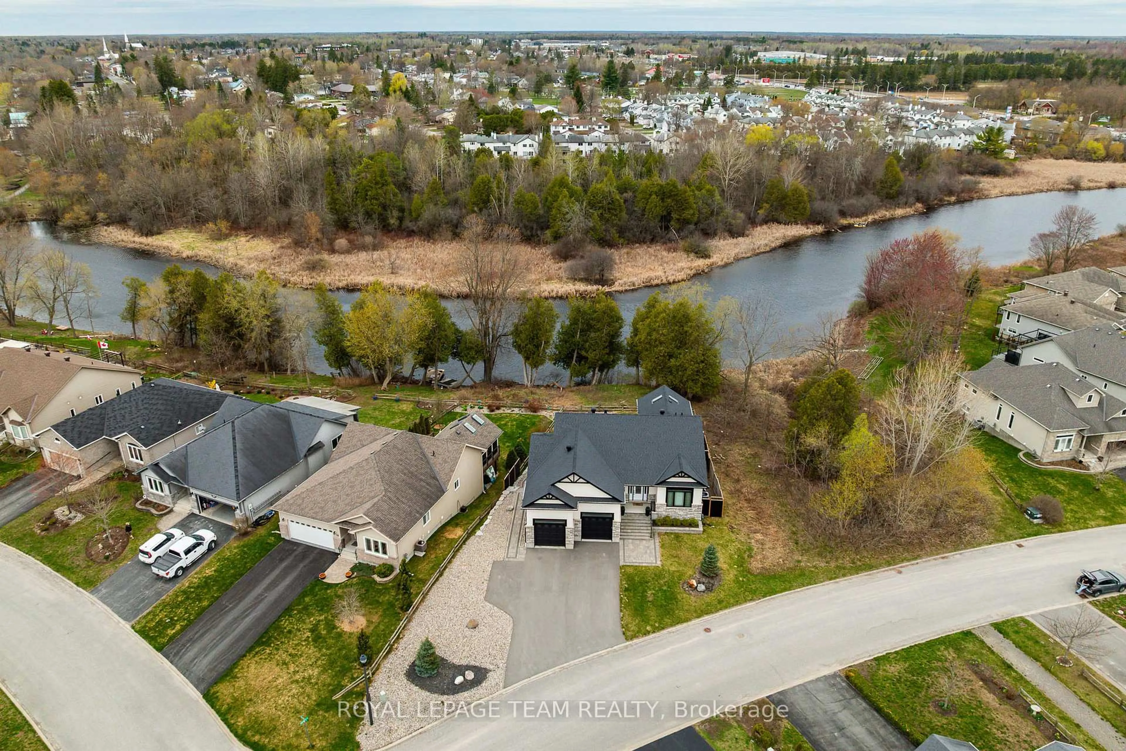 A pic from outside/outdoor area/front of a property/back of a property/a pic from drone, water/lake/river/ocean view for 51 Westerra Way, North Grenville Ontario K0G 1J0