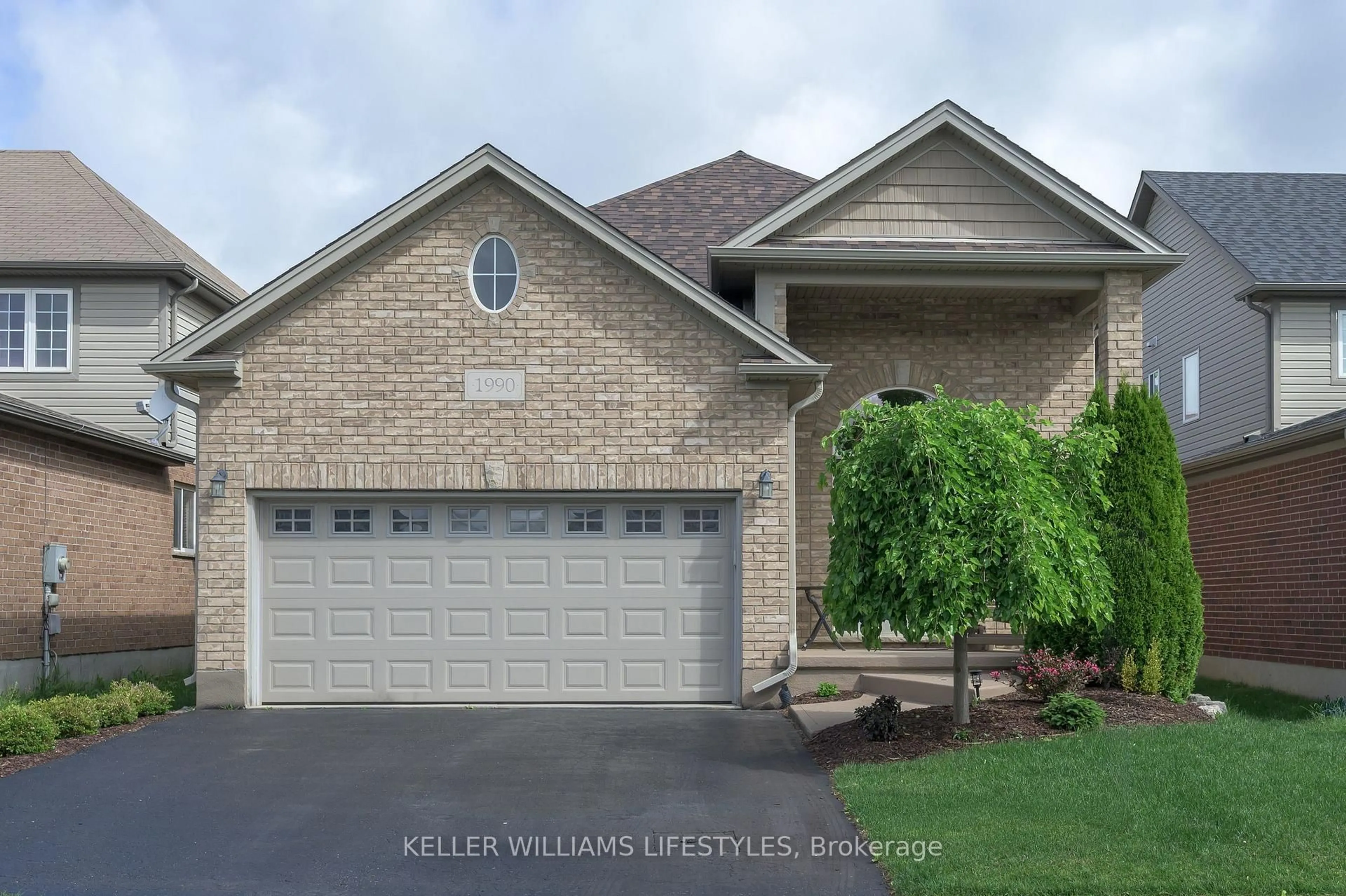 Home with brick exterior material, street for 1990 Foxwood Ave, London North Ontario N6G 0C5