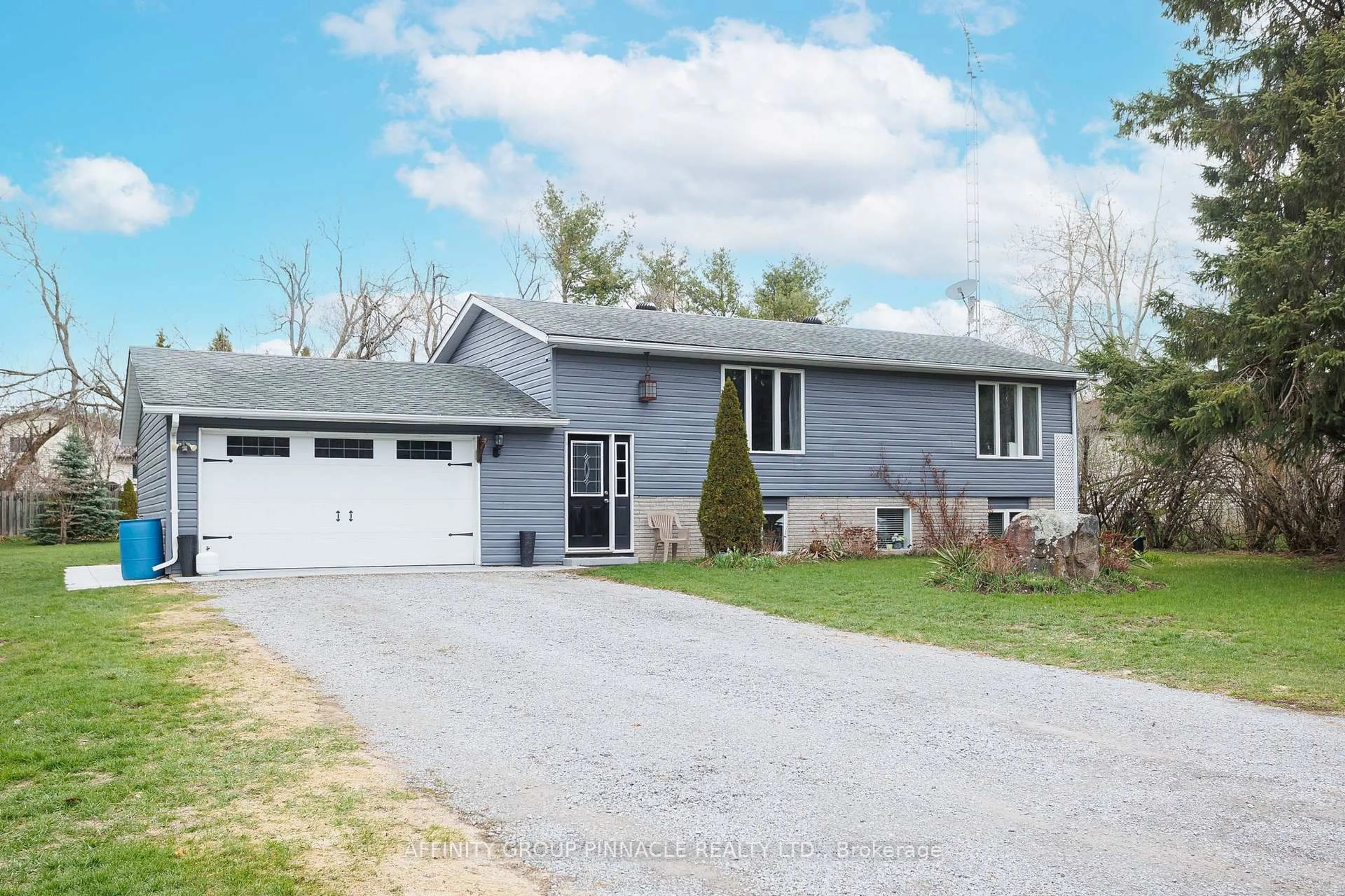 Home with vinyl exterior material, street for 7 Hawk St, Kawartha Lakes Ontario K0M 2T0
