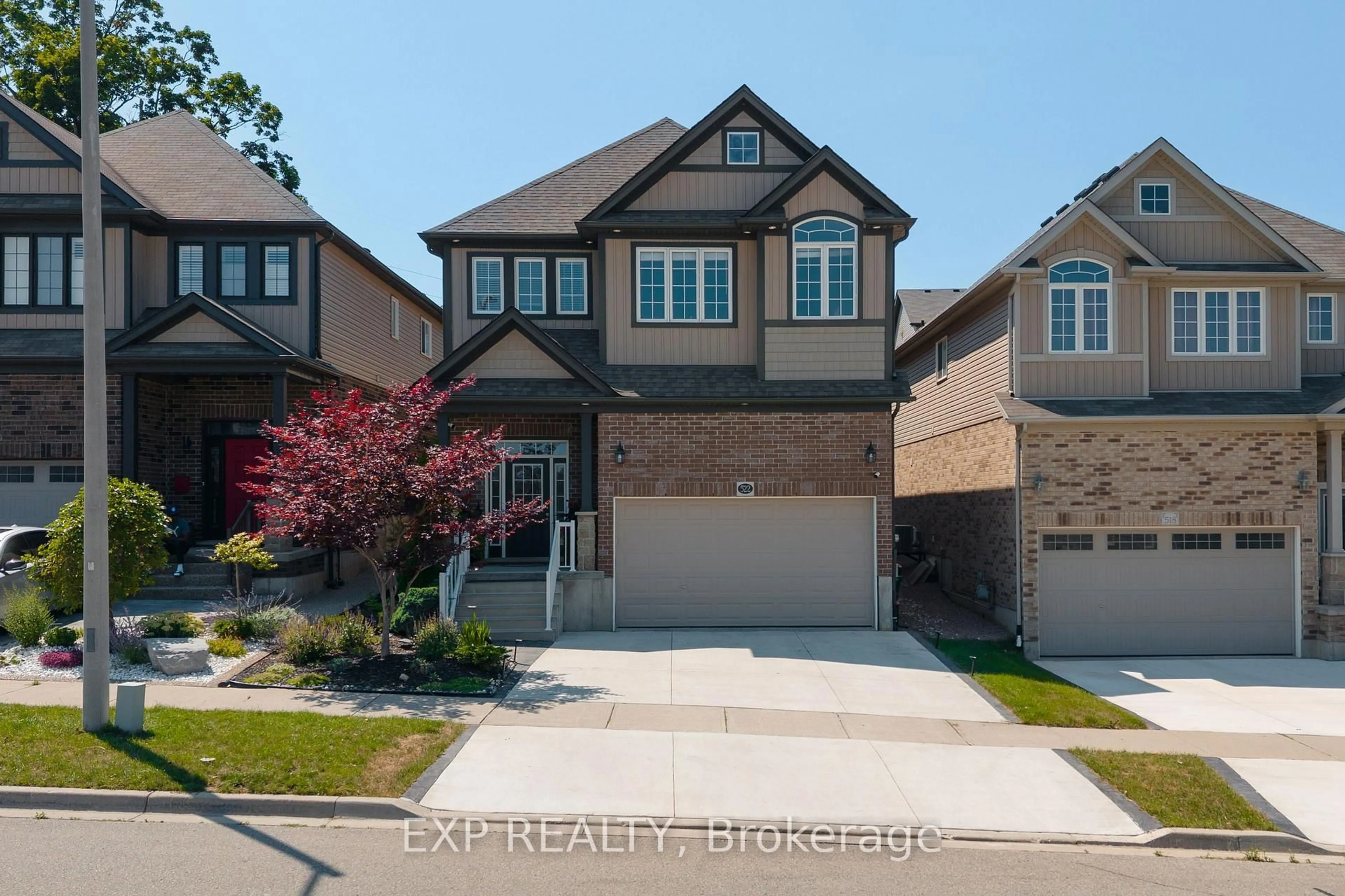 Home with brick exterior material, street for 522 Woodbine Ave, Kitchener Ontario N2R 1Y9