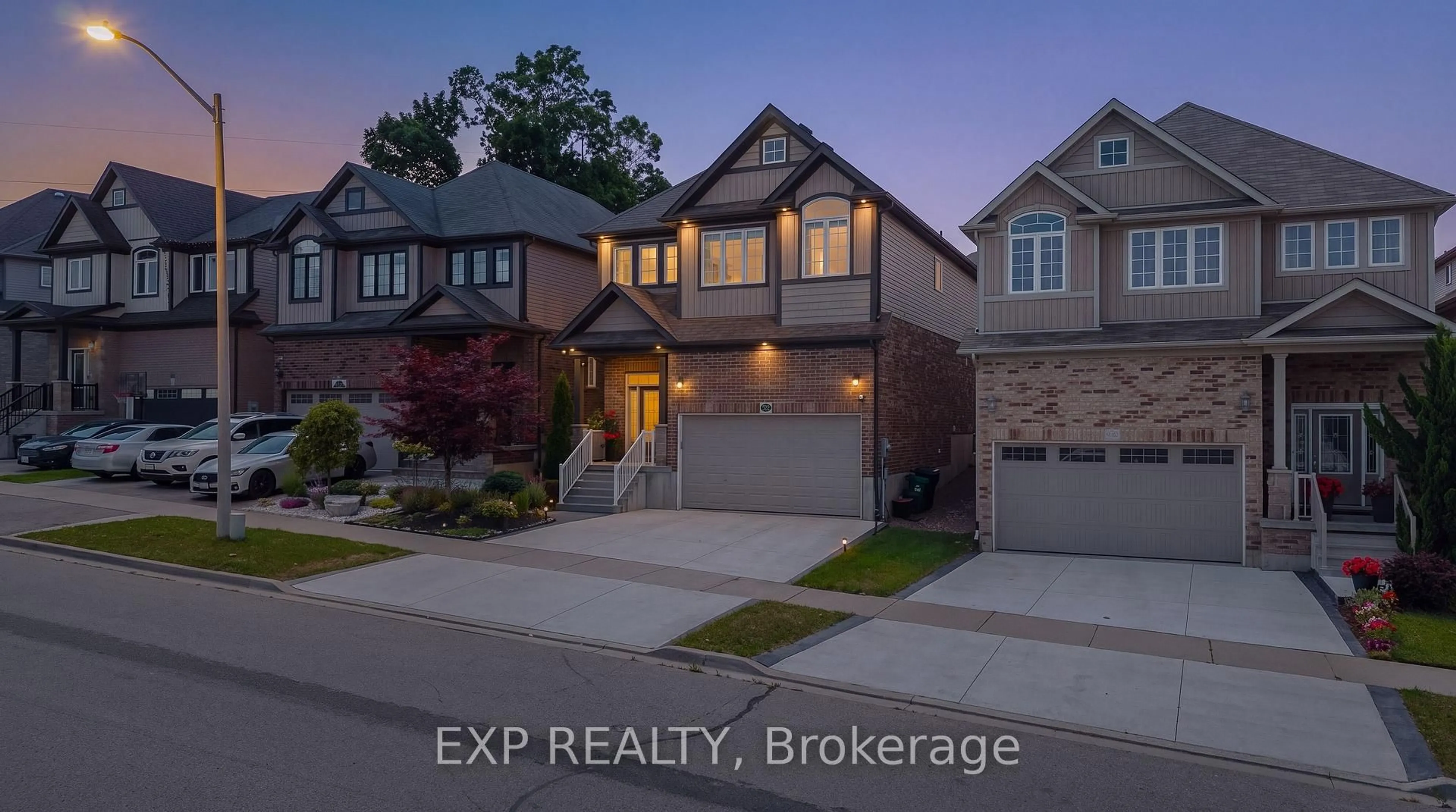 Home with brick exterior material, street for 522 Woodbine Ave, Kitchener Ontario N2R 1Y9