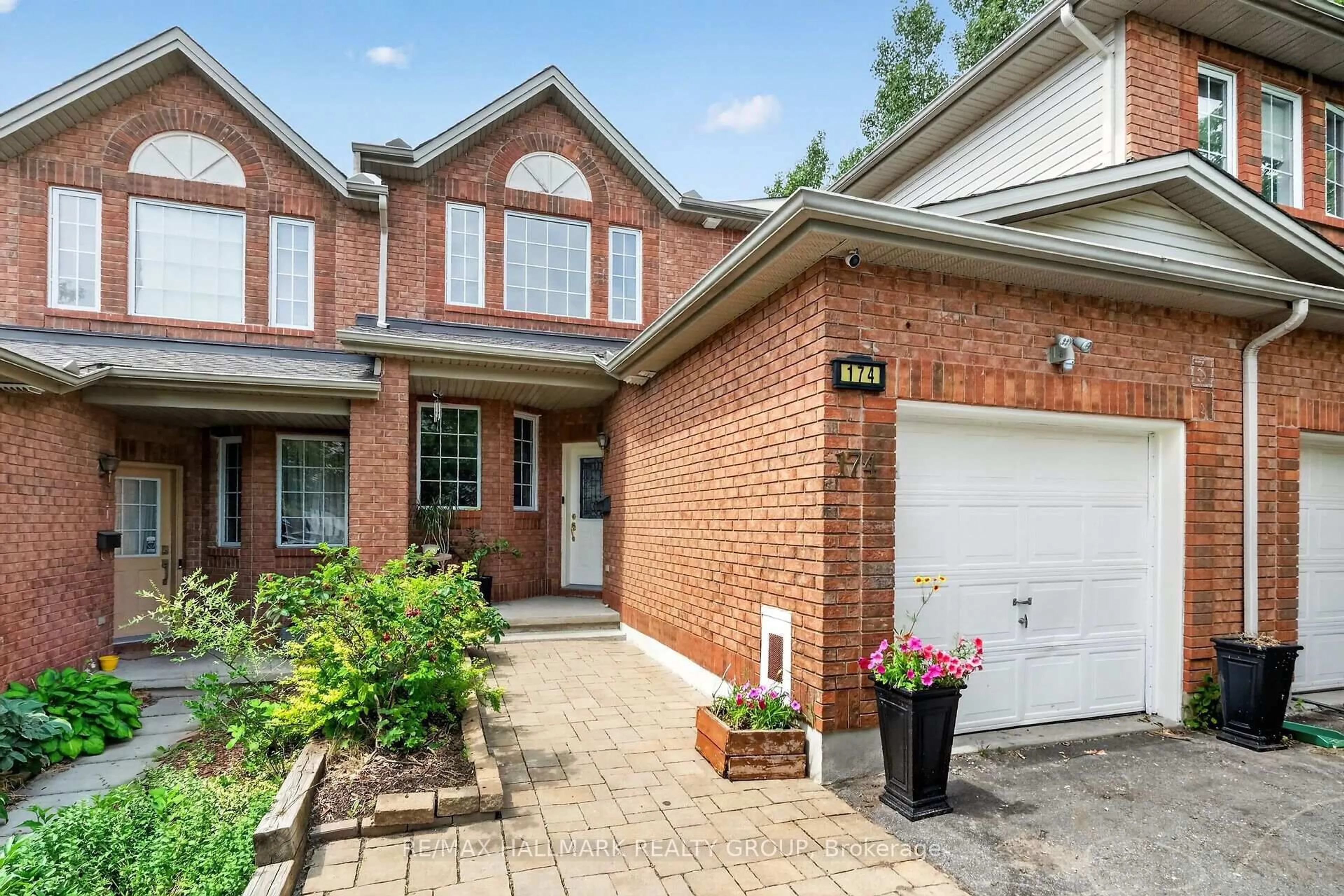 Home with brick exterior material, street for 174 Carwood Circ, Ottawa Ontario K1K 4V6