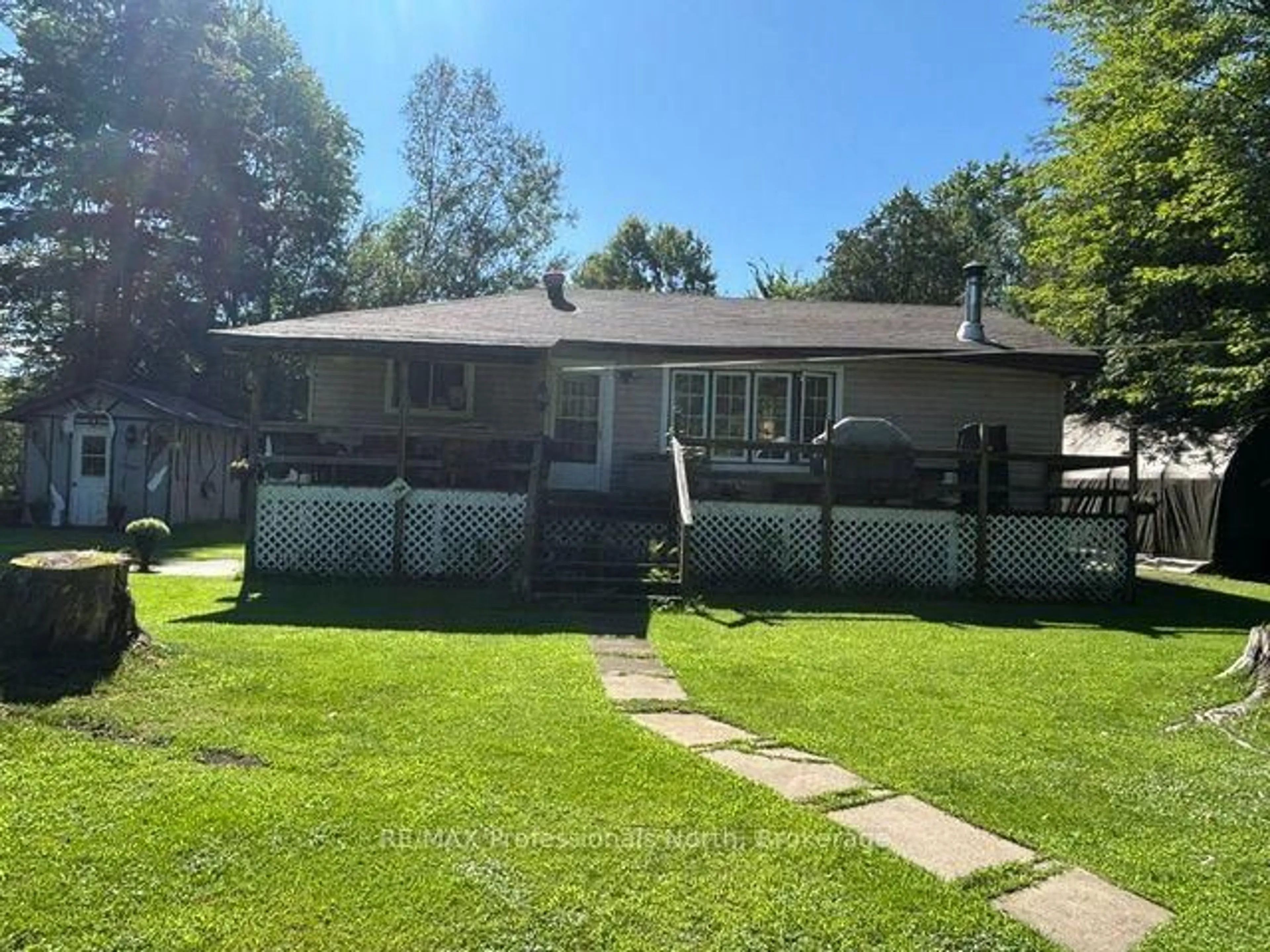 A pic from outside/outdoor area/front of a property/back of a property/a pic from drone, street for 1436 Spring Valley Rd, Minden Hills Ontario K0M 2K0