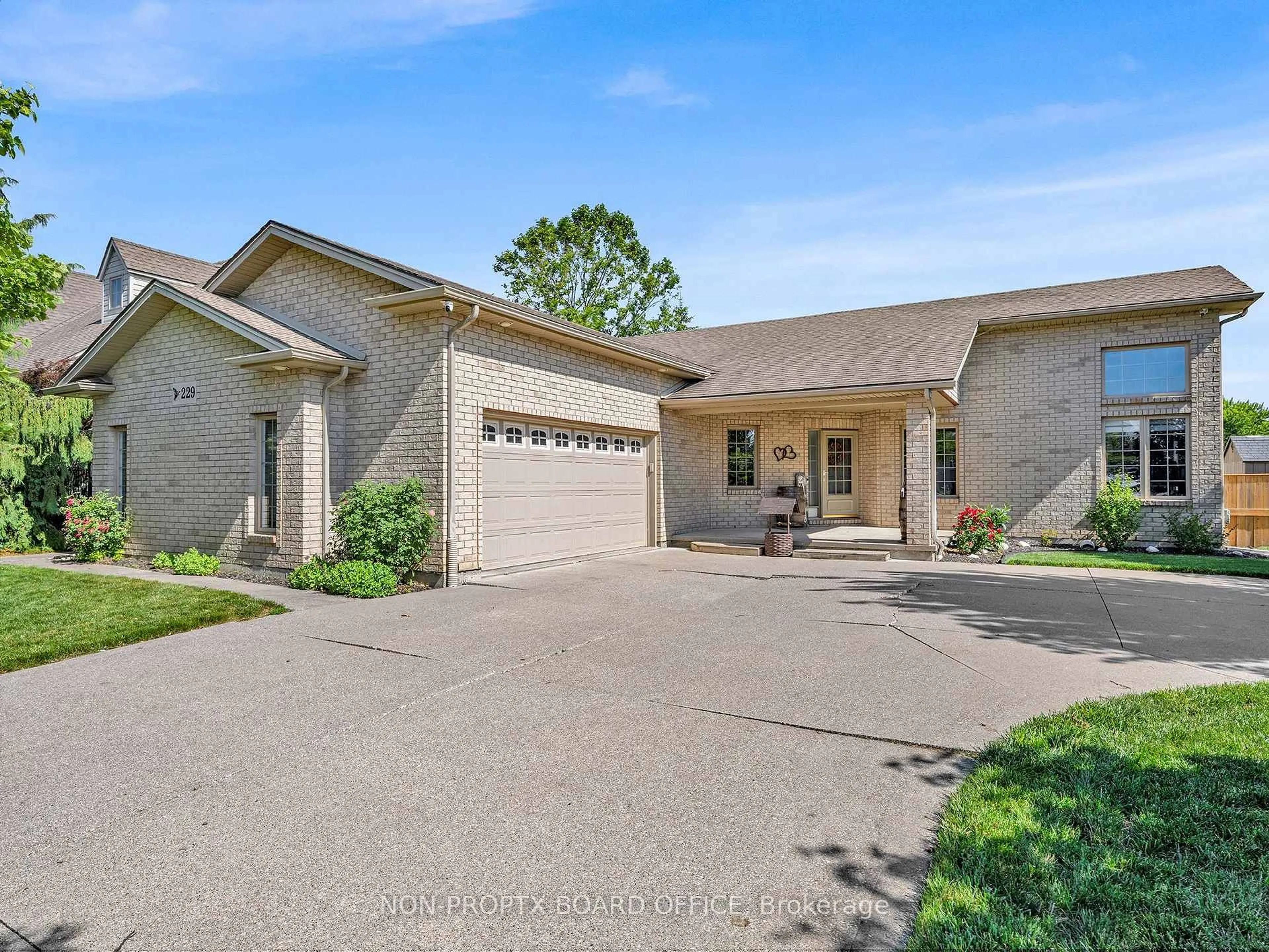 Home with brick exterior material, street for 229 St. Peter St, Lakeshore Ontario N8L 0N9
