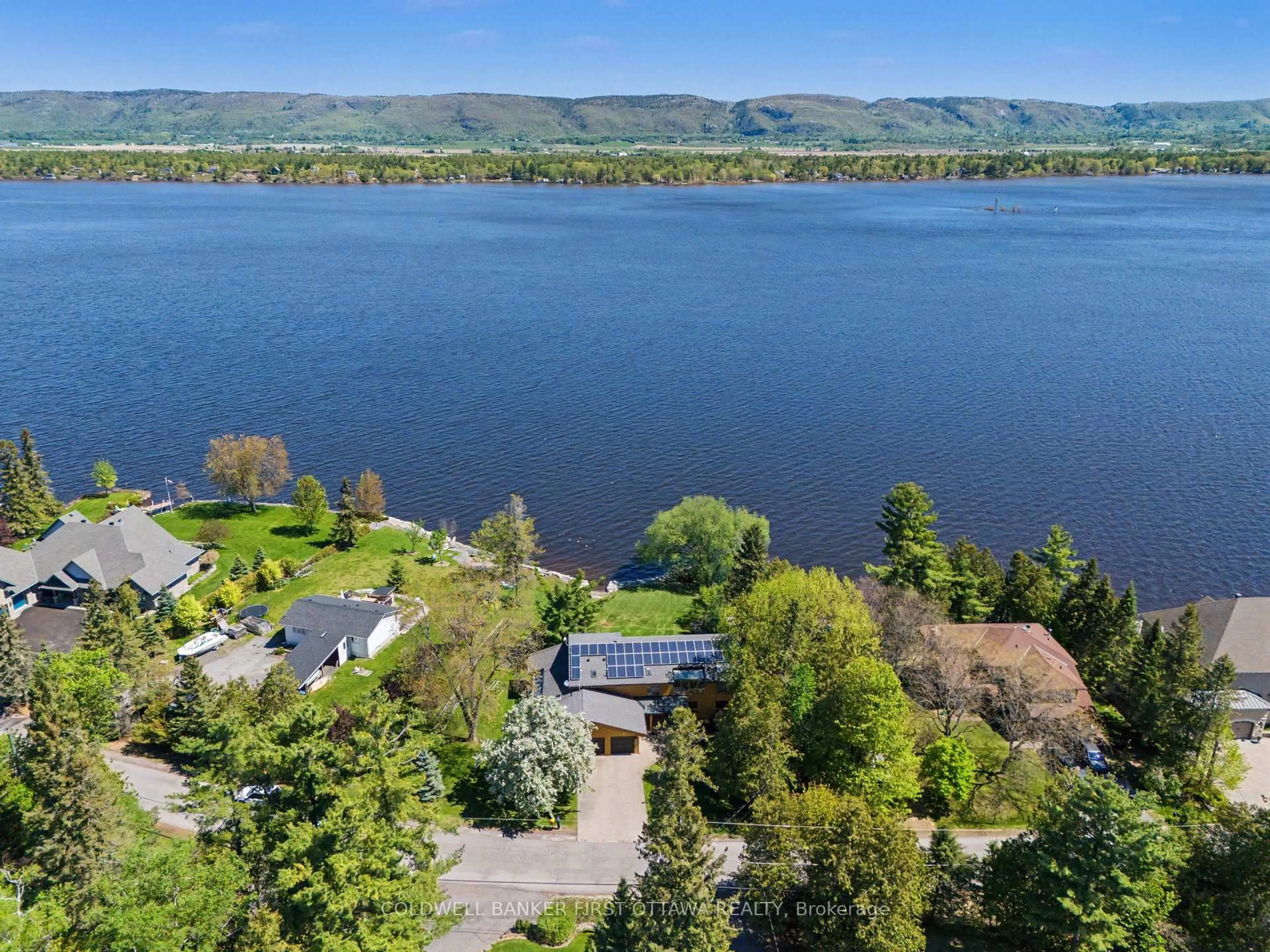 A pic from outside/outdoor area/front of a property/back of a property/a pic from drone, water/lake/river/ocean view for 3842 Armitage Ave, Ottawa Ontario K0A 1T0