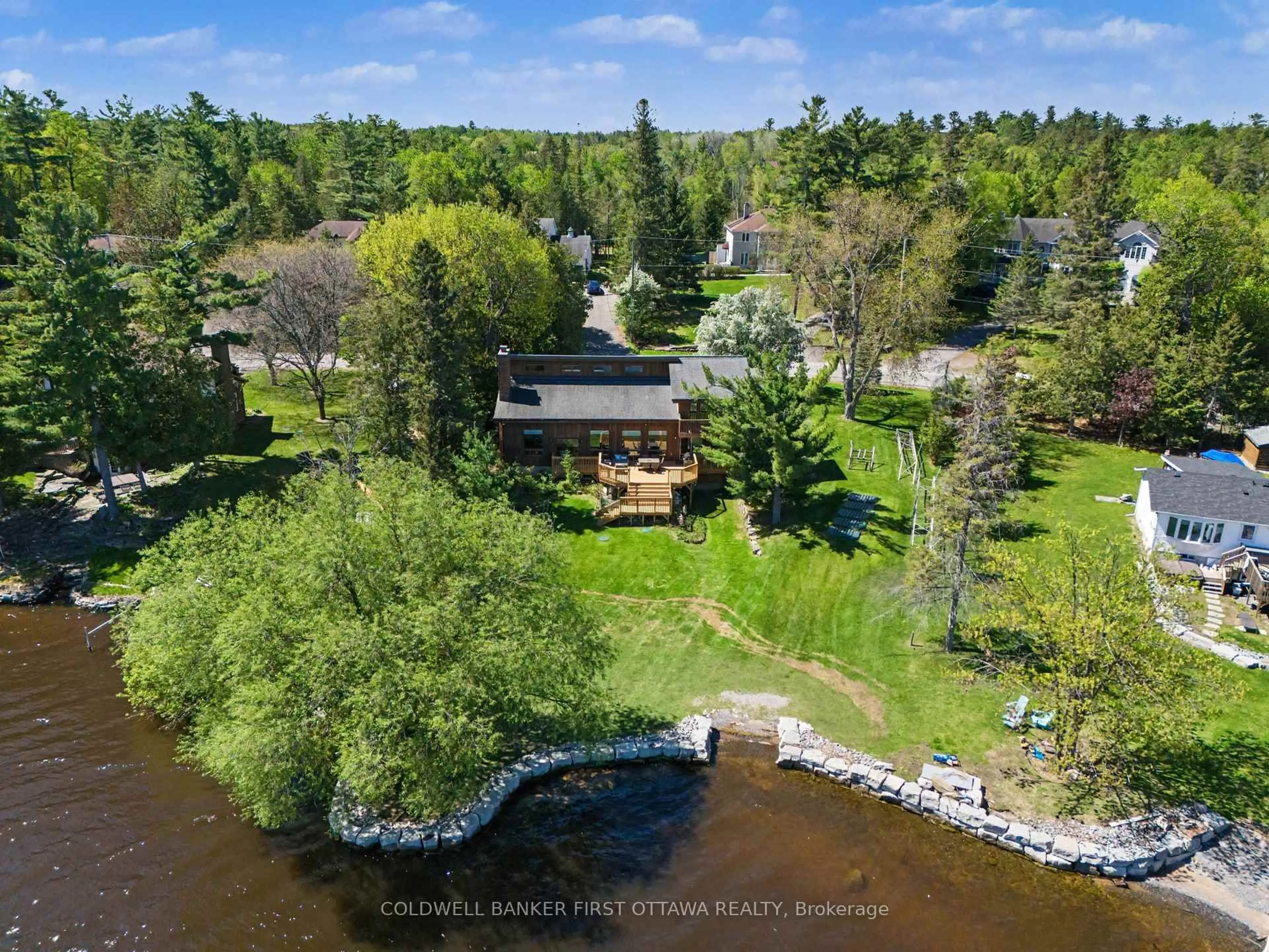 A pic from outside/outdoor area/front of a property/back of a property/a pic from drone, water/lake/river/ocean view for 3842 Armitage Ave, Ottawa Ontario K0A 1T0