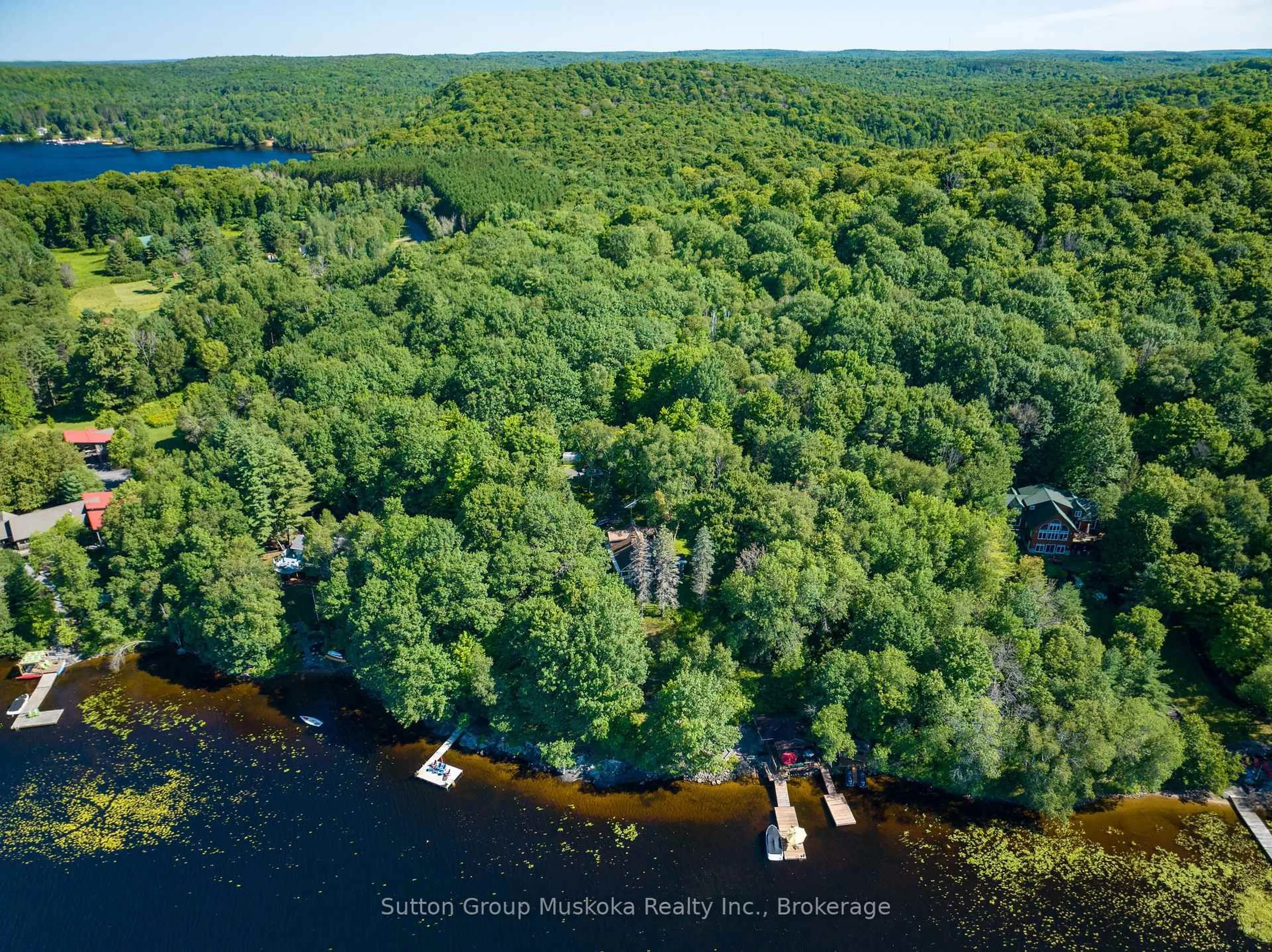 A pic from outside/outdoor area/front of a property/back of a property/a pic from drone, water/lake/river/ocean view for 29 Island View Lane, Huntsville Ontario P1H 2N5