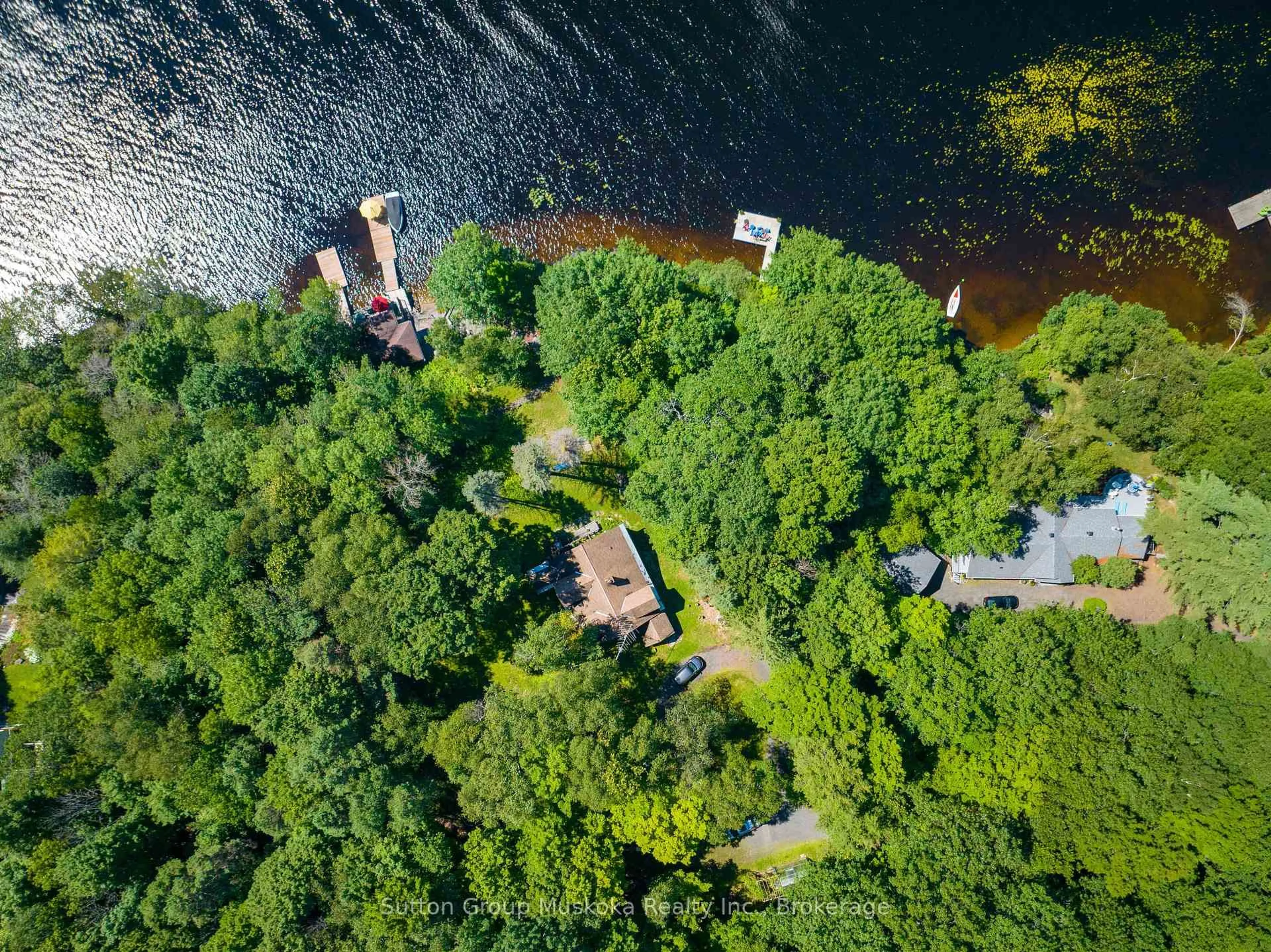 A pic from outside/outdoor area/front of a property/back of a property/a pic from drone, water/lake/river/ocean view for 29 Island View Lane, Huntsville Ontario P1H 2N5